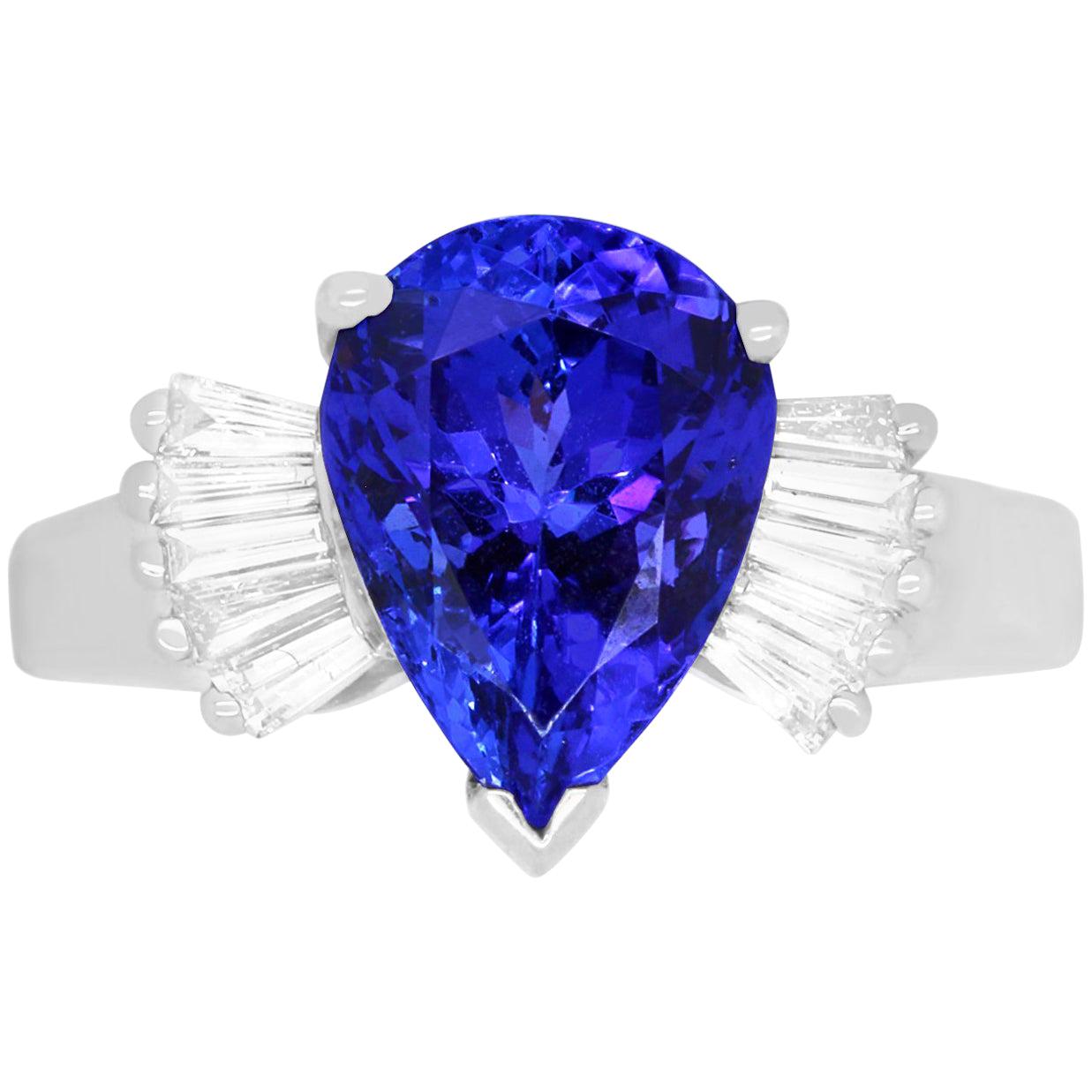 2.73 Carat Pear Shaped AAA Tanzanite and 0.27 Carat White Diamond Baguette Ring