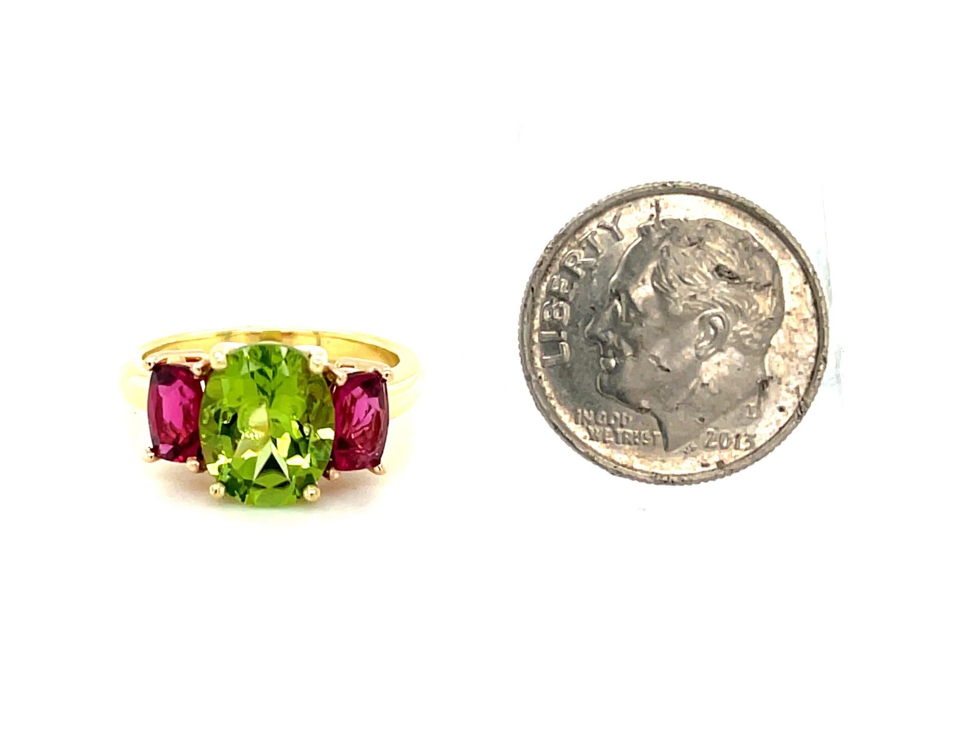 Peridot and Rubellite Pink Tourmaline Three-Stone Ring in Rose and Yellow Gold In New Condition For Sale In Los Angeles, CA