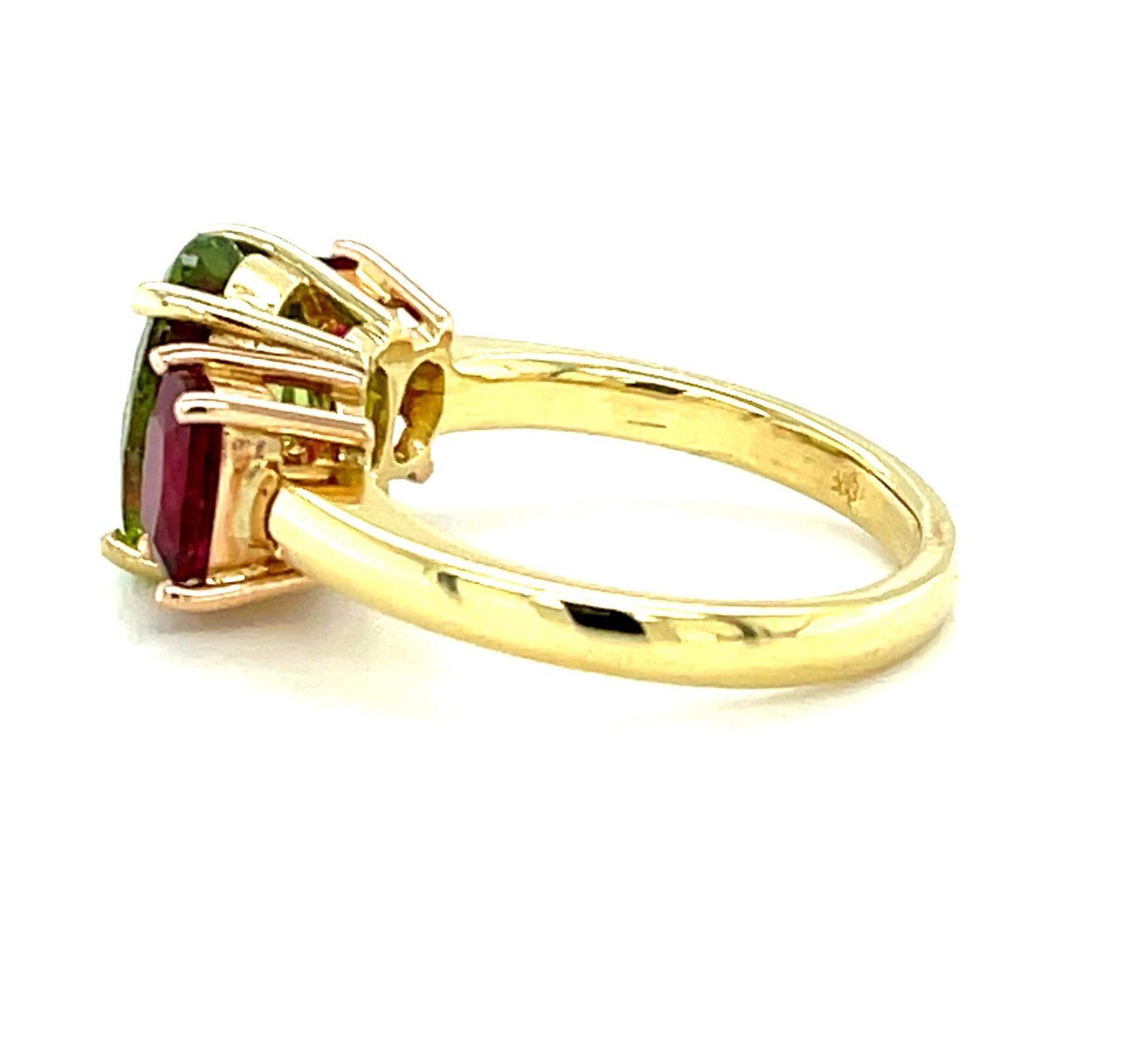 Artisan Peridot and Rubellite Pink Tourmaline Three-Stone Ring in Rose and Yellow Gold For Sale