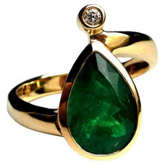 2.73 Carat Vivid Green Emerald 
Diamond in Gold with Poetry Cocktail Ring