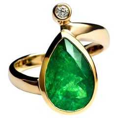 2.73 Carat Vivid Green Emerald 
Diamond in Gold with Poetry Cocktail Ring