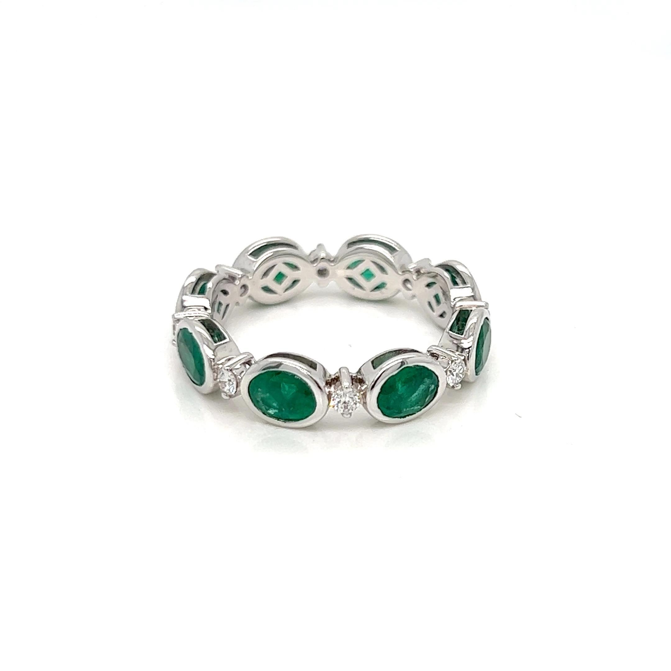 Modern 2.73 Carats Emerald and Diamond Eternity Band Ring in Bezel Setting  For Sale