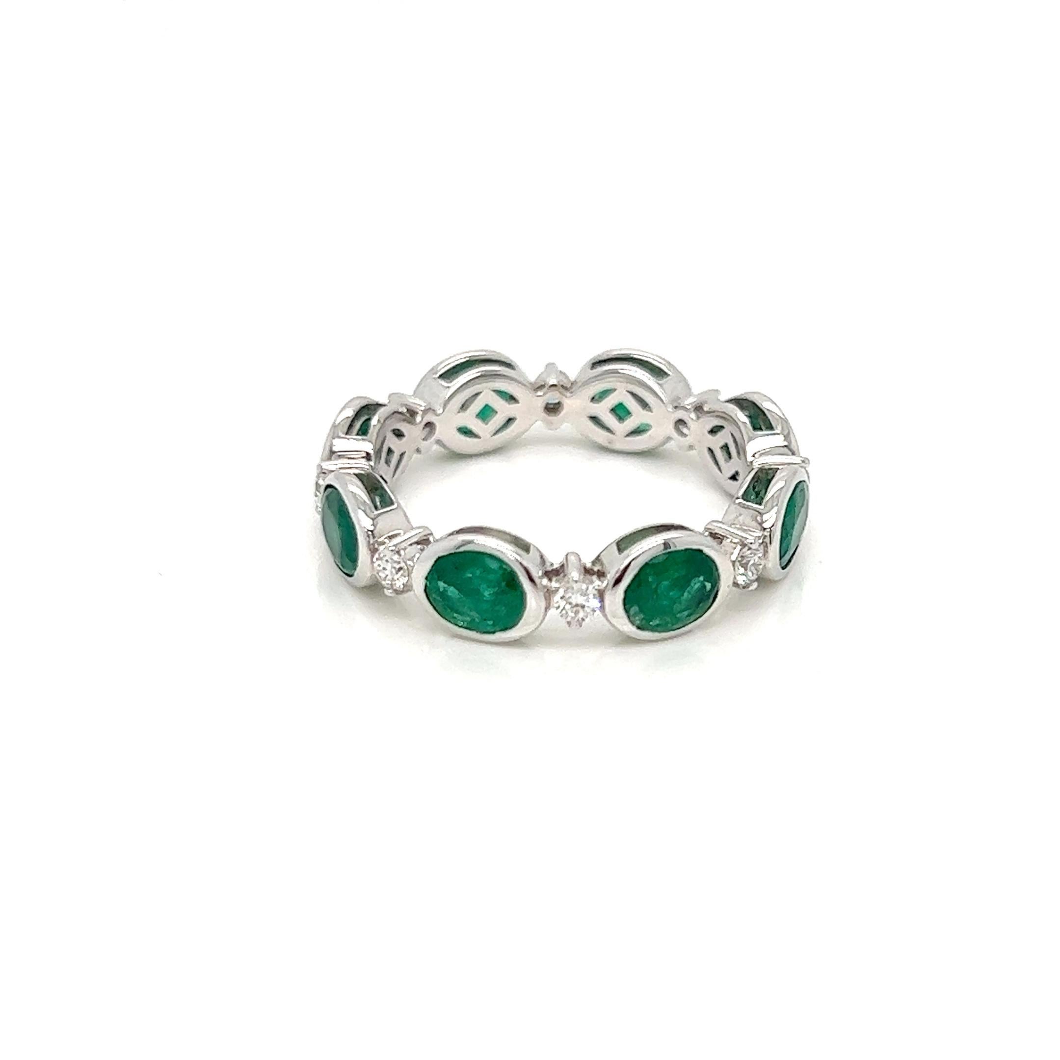 Oval Cut 2.73 Carats Emerald and Diamond Eternity Band Ring in Bezel Setting  For Sale