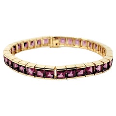 Pulsera de tenis de oro de 14 quilates con granate rodolita talla esmeralda total de 27,30 quilates