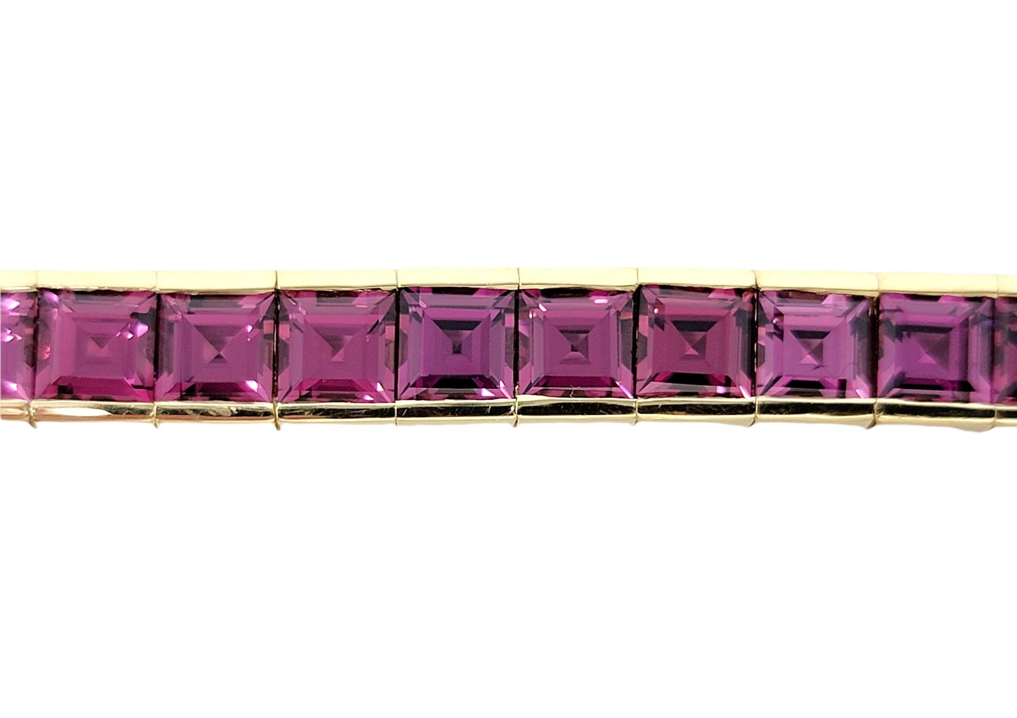 Women's 27.30 Carats Total Emerald Cut Rhodolite Garnet 14 Karat Gold Tennis Bracelet For Sale