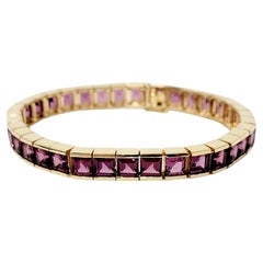 27.30 Carats Total Emerald Cut Rhodolite Garnet 14 Karat Gold Tennis Bracelet