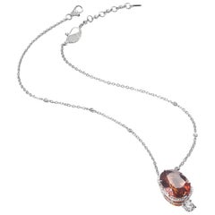 Collier de grenats mandarins 27,31 carats et spessartines en or blanc