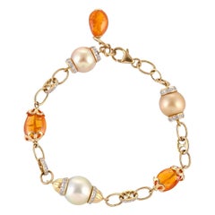 27.37 South Sea Pearl Mandarin Garnet Diamond 18 Karat Yellow Gold Bracelet