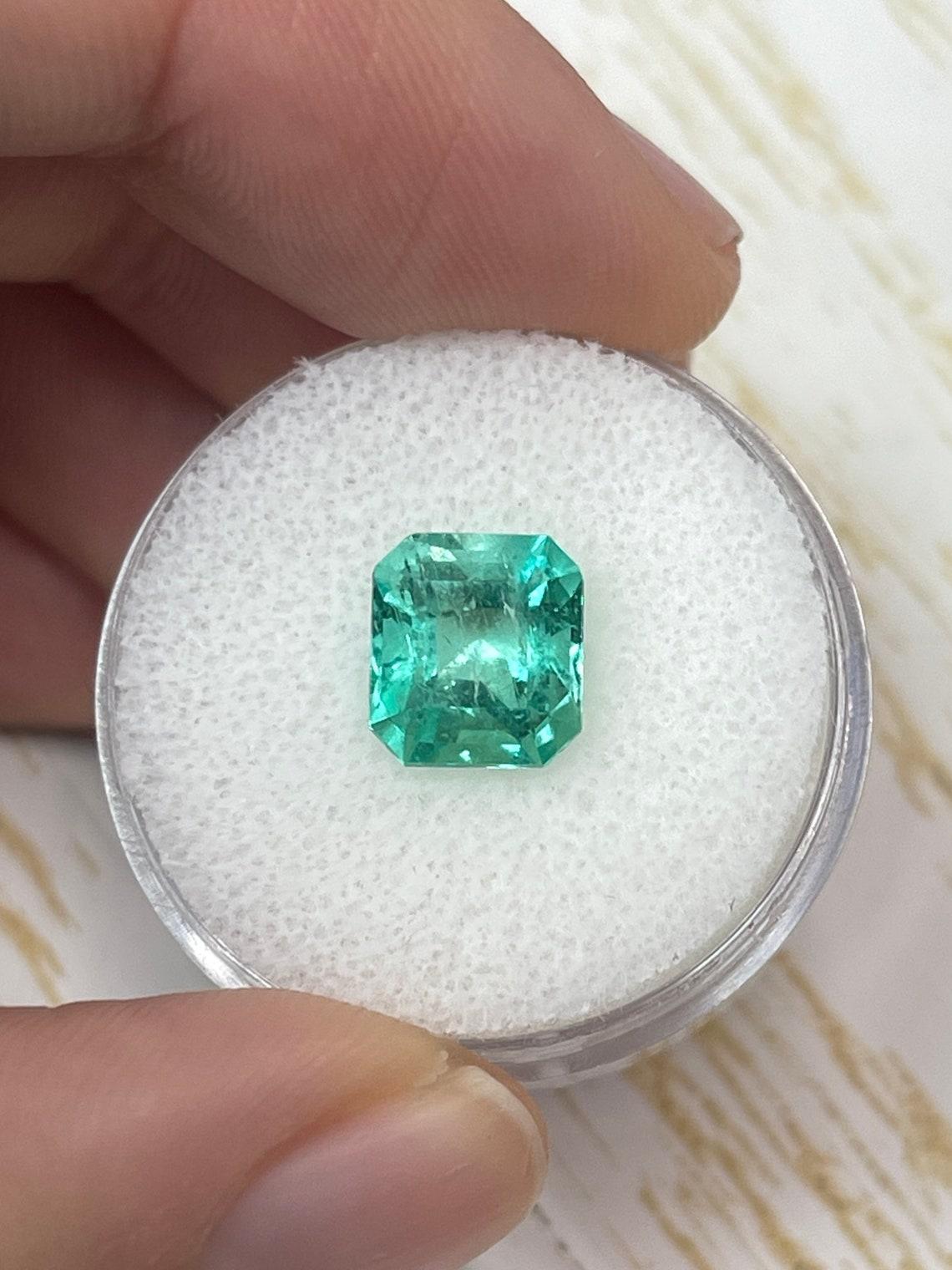 Stone: Emerald
Weight: 2.73-carats
Shape: Emerald Cut
Clarity: Transparent
Luster: Excellent
Color: Bright Medium Green
Measurements: 8.72mm x 7.86mm x 6.16mm
Geographic Origin: Colombia
Treatment: Natural, Oiling

Comments: Due to their growth