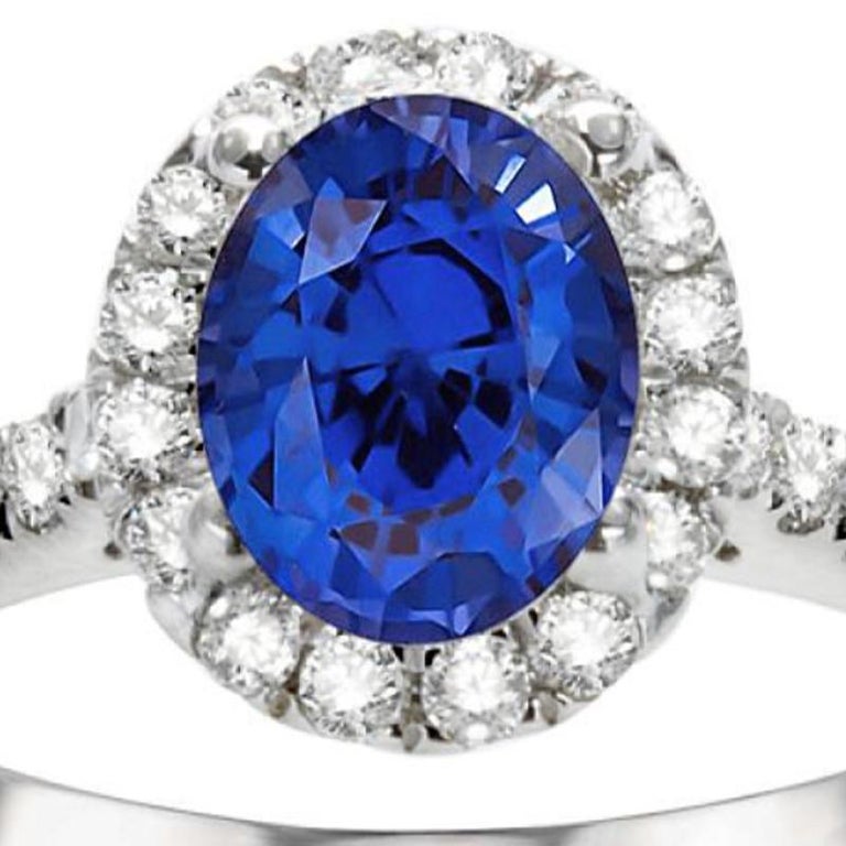 Oval Cut 2.73ct Oval Sapphire Ring in 14K White Gold; 0.72ct Side Diamonds For Sale