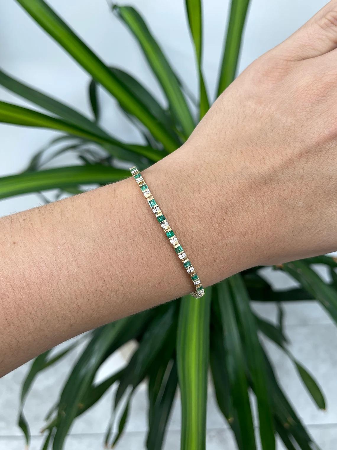 Featured is a beautiful emerald and diamond unisex bracelet. This bracelet carries almost two full carats of emeralds-baguette cut with very good clarity and luster. Channel set with numerous brilliant round cur diamonds going along the entire