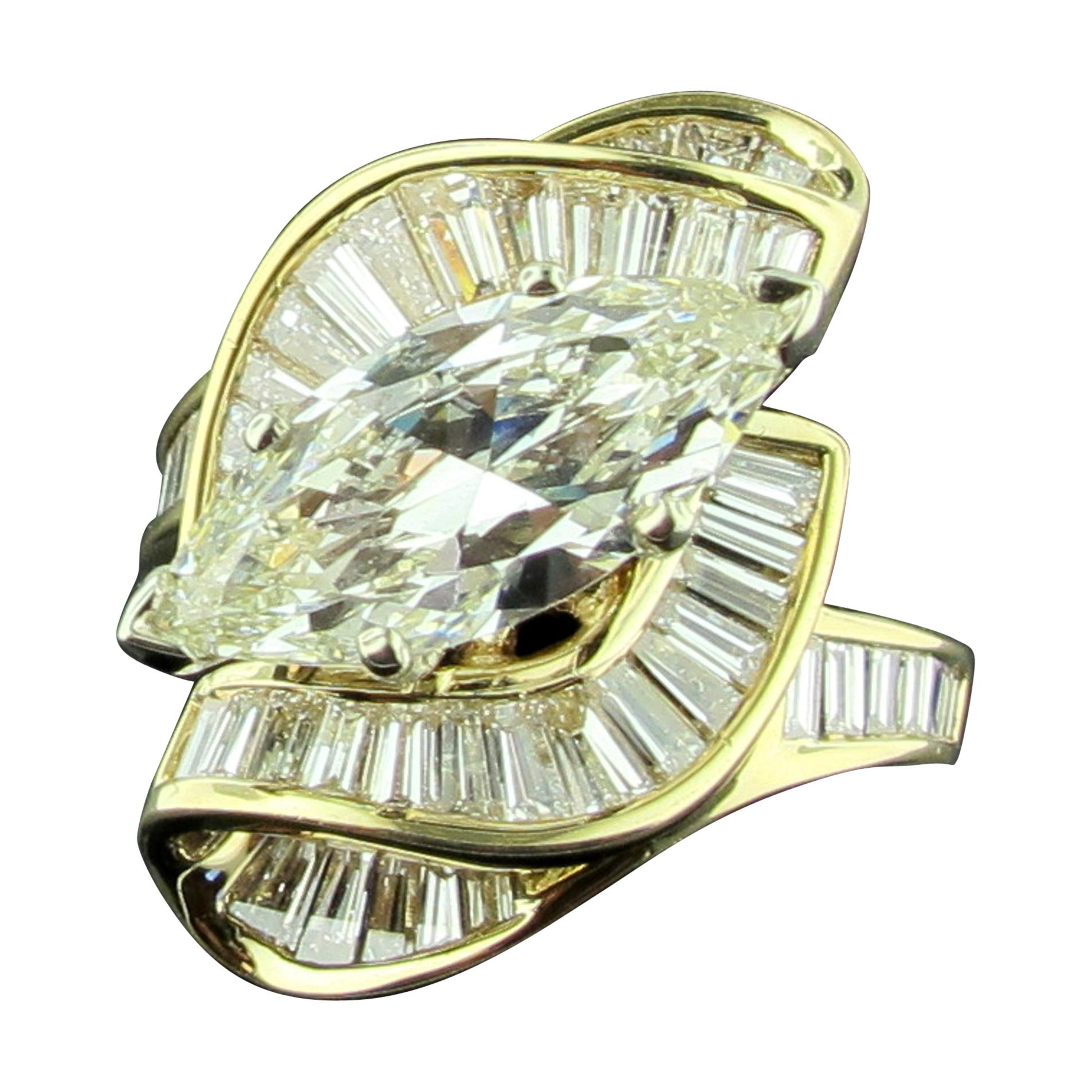 2.74 Carat Marquise Set in 14 Karat Yellow Gold and 68 Baguettes at 1stDibs