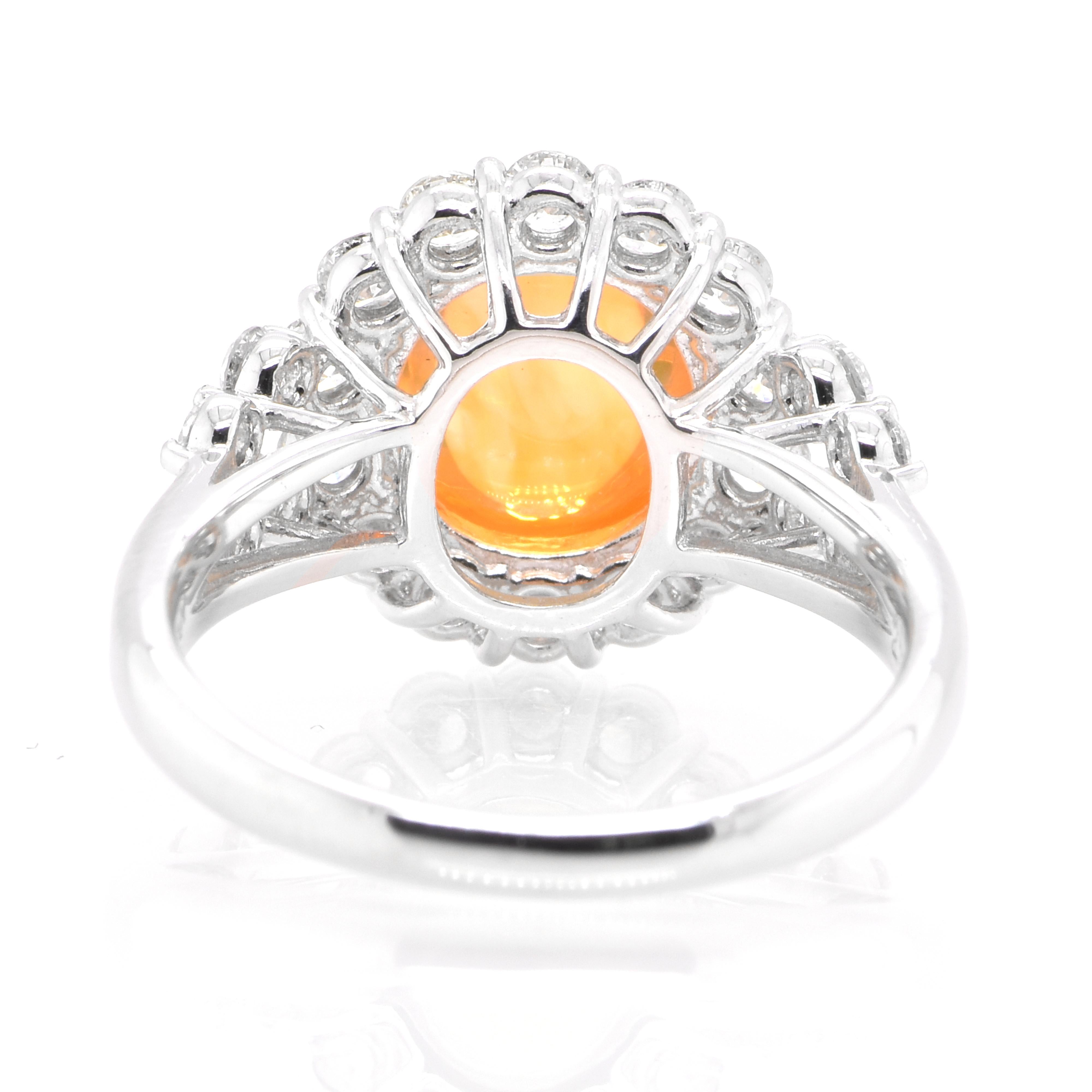 Modern 2.74 Carat Natural Mexican Fire Opal and Diamond Halo Ring Set in Platinum