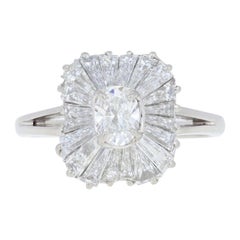 2.74 Carat Oval and Baguette Cut Diamond Ring, Platinum Wavy Halo GIA