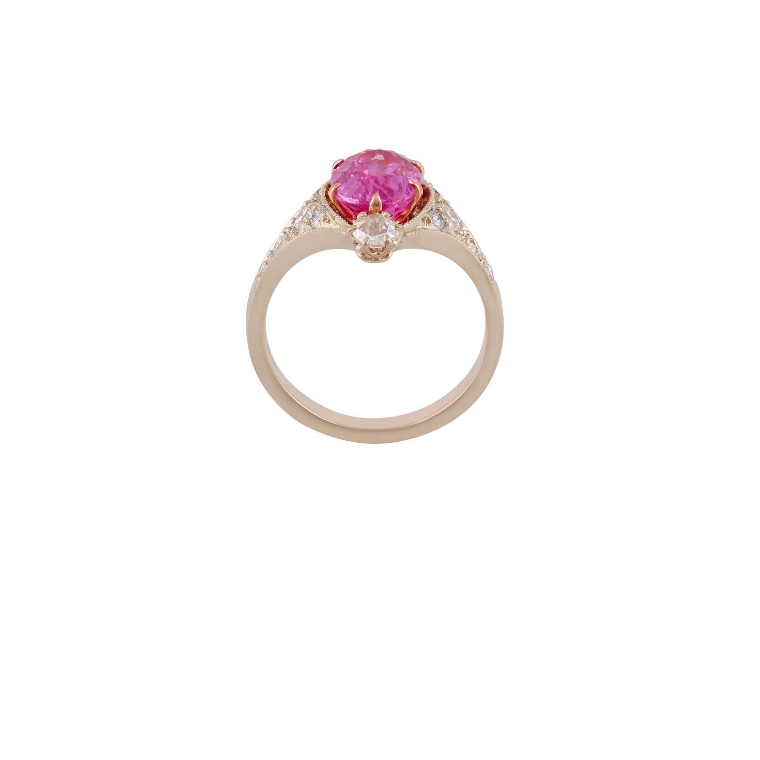 Oval Shaped Pink Sapphire - 2.74 Cts.
Diamond Rose Cuts - 0.25 Cts.
Round Shaped Diamonds - 0.46 Cts.
18 Karat White Gold - 4.92 Grams.