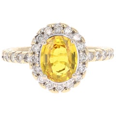 2.74 Carat Yellow Sapphire Diamond Halo 14 Karat Yellow Gold Ring