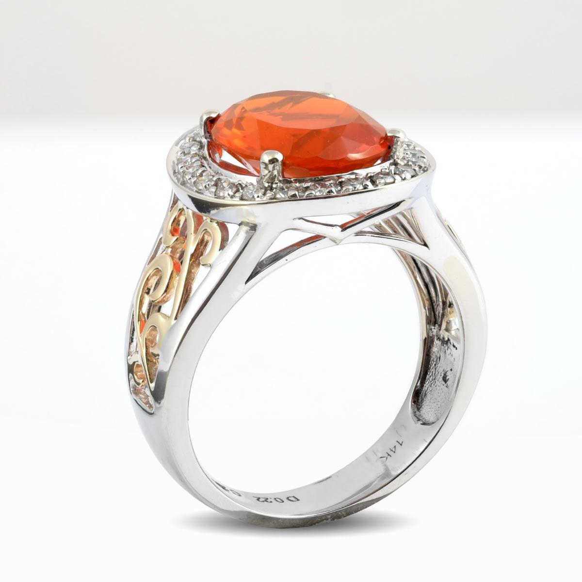 Fire Opal is the variety from the opal species that has a vibrant orange color like that of the setting sun. Beautiful in all its glory, this one that measures 2.74 carats, has been cut to reveal its beautiful clear interior free of any inclusions.