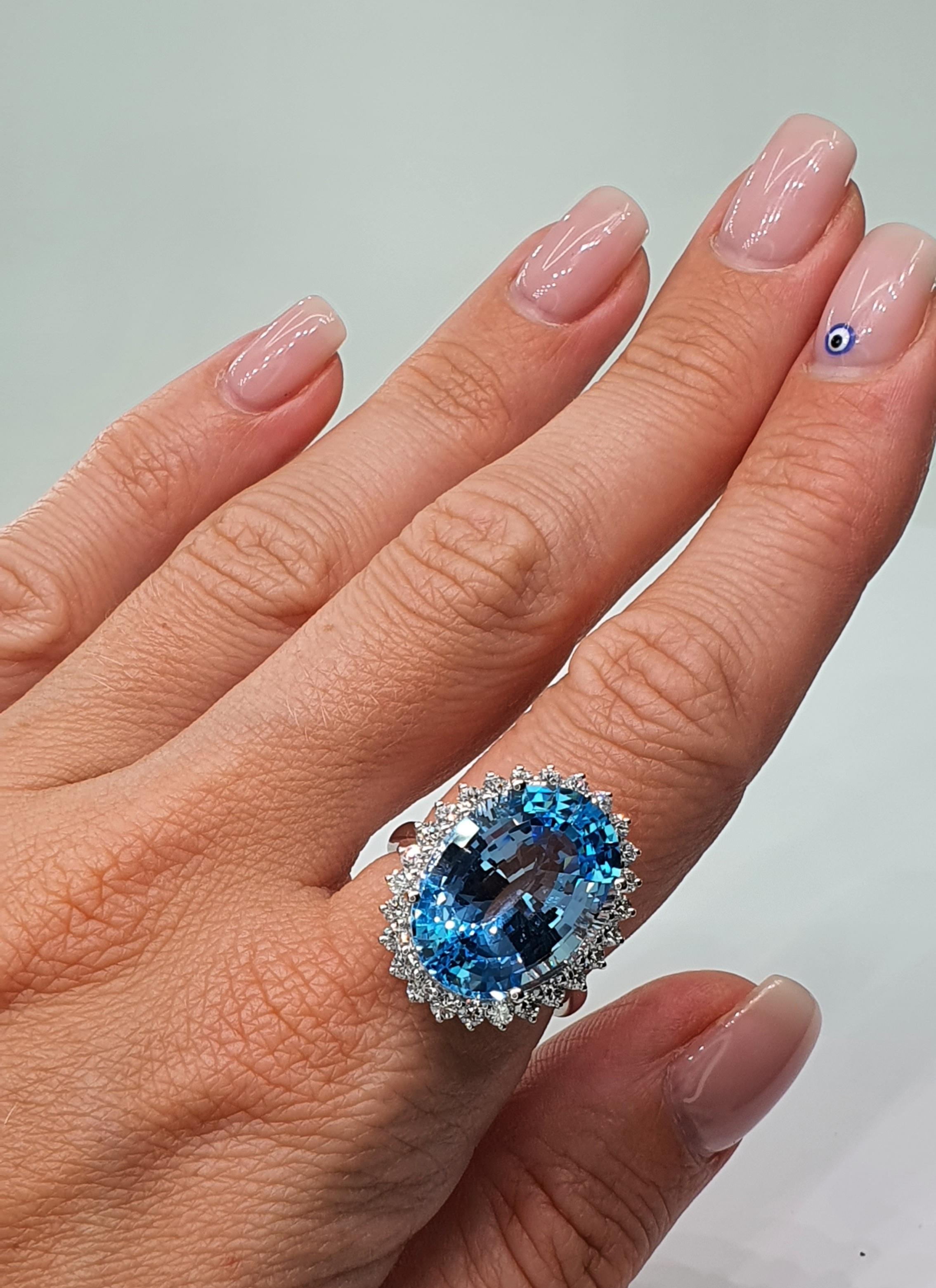 Women's or Men's 27.47 Carat Blue Topaz Diamond 18 Karat White Gold Ring For Sale