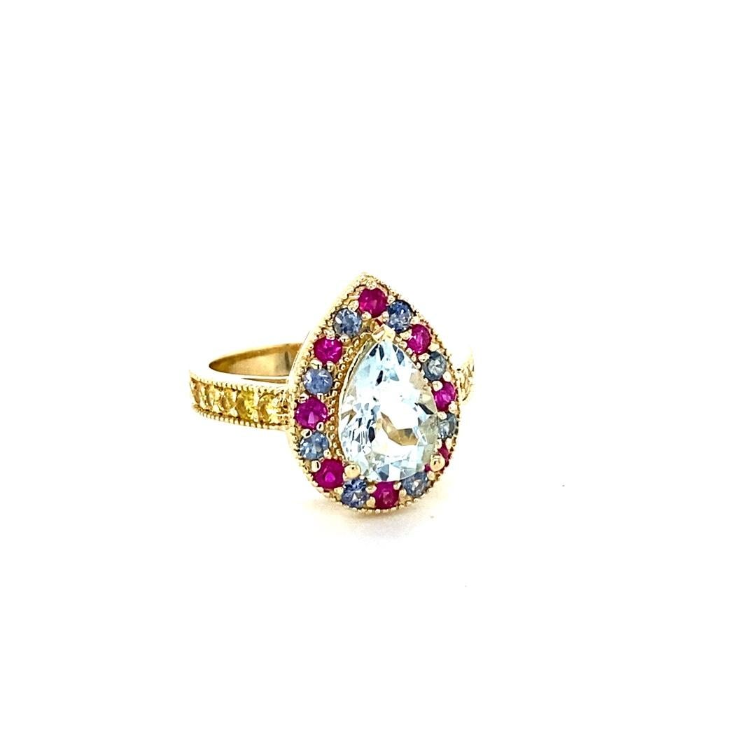 Contemporary 2.75 Carat Aquamarine Multi Color Sapphire Yellow Gold Cocktail Ring For Sale