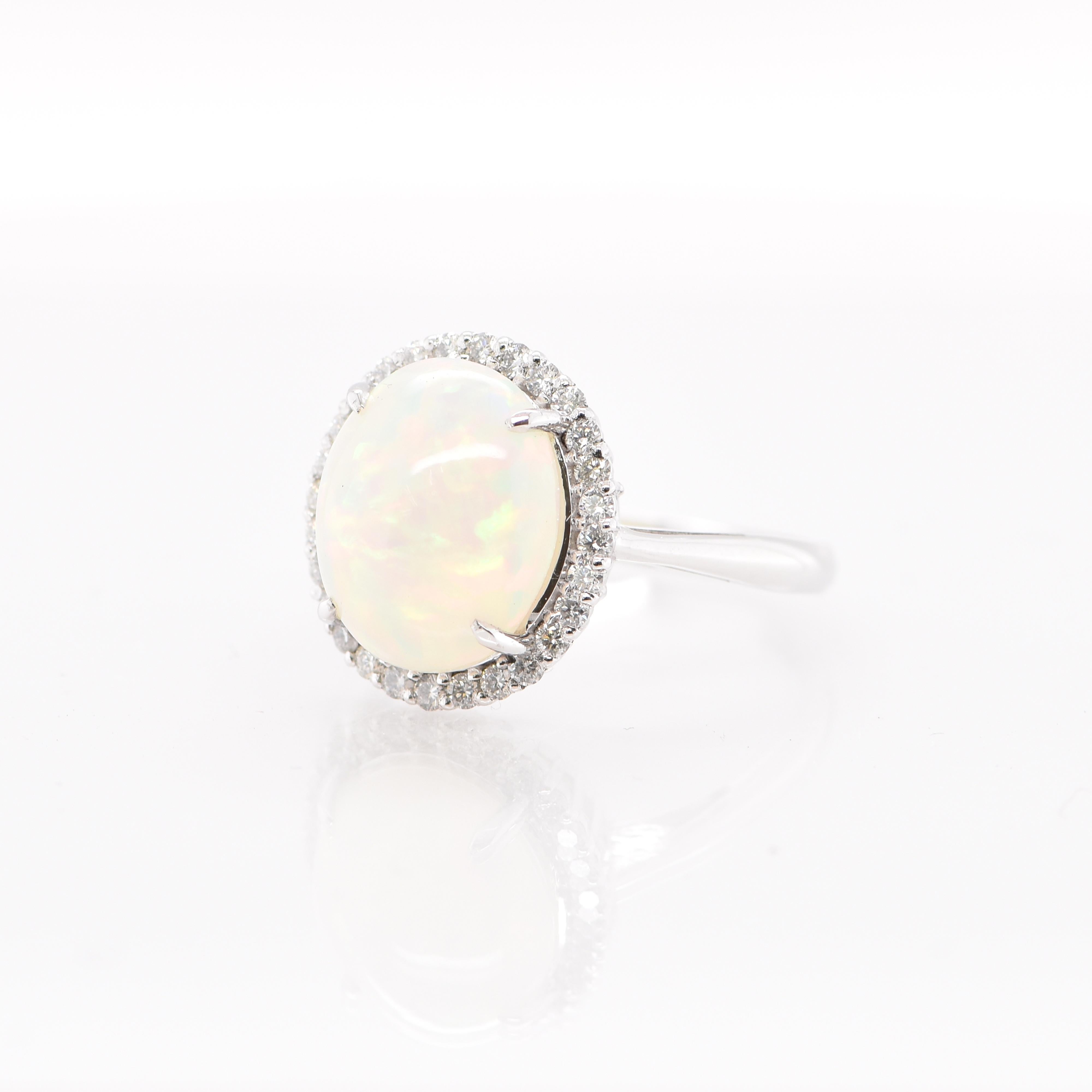 Modern 2.75 Carat Natural Ethiopian White Opal and Diamond Halo Ring Set in Platinum