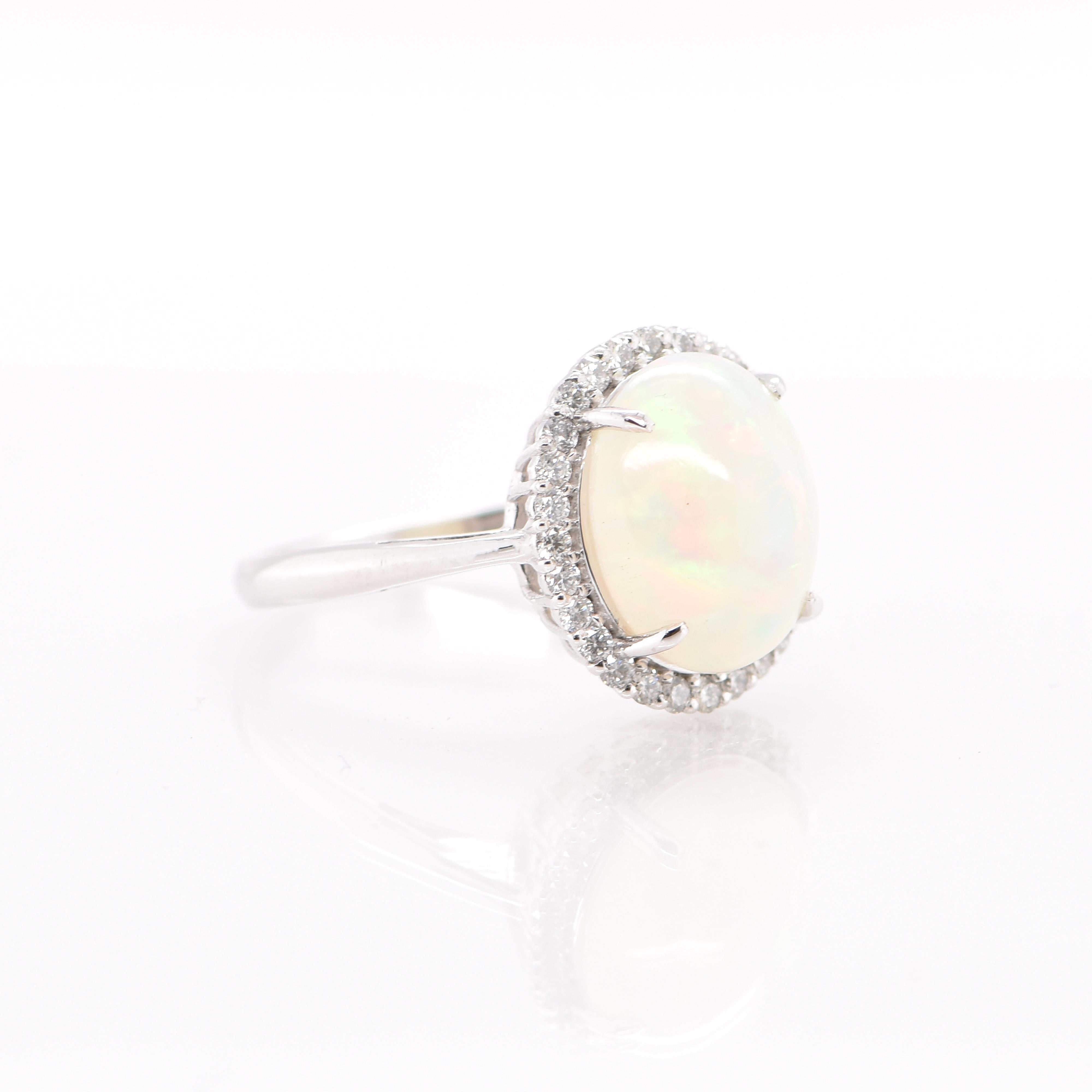 Cabochon 2.75 Carat Natural Ethiopian White Opal and Diamond Halo Ring Set in Platinum