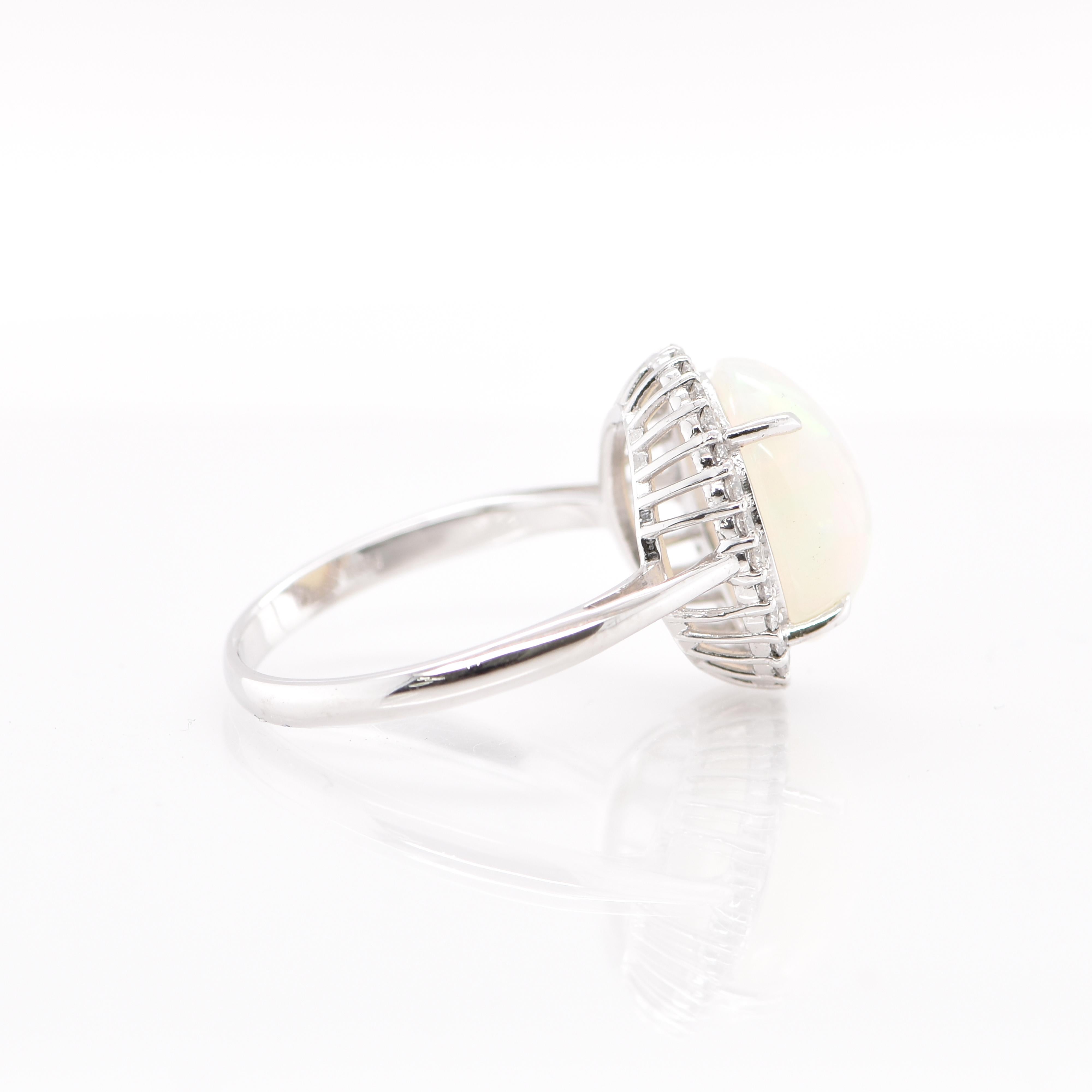 Women's 2.75 Carat Natural Ethiopian White Opal and Diamond Halo Ring Set in Platinum