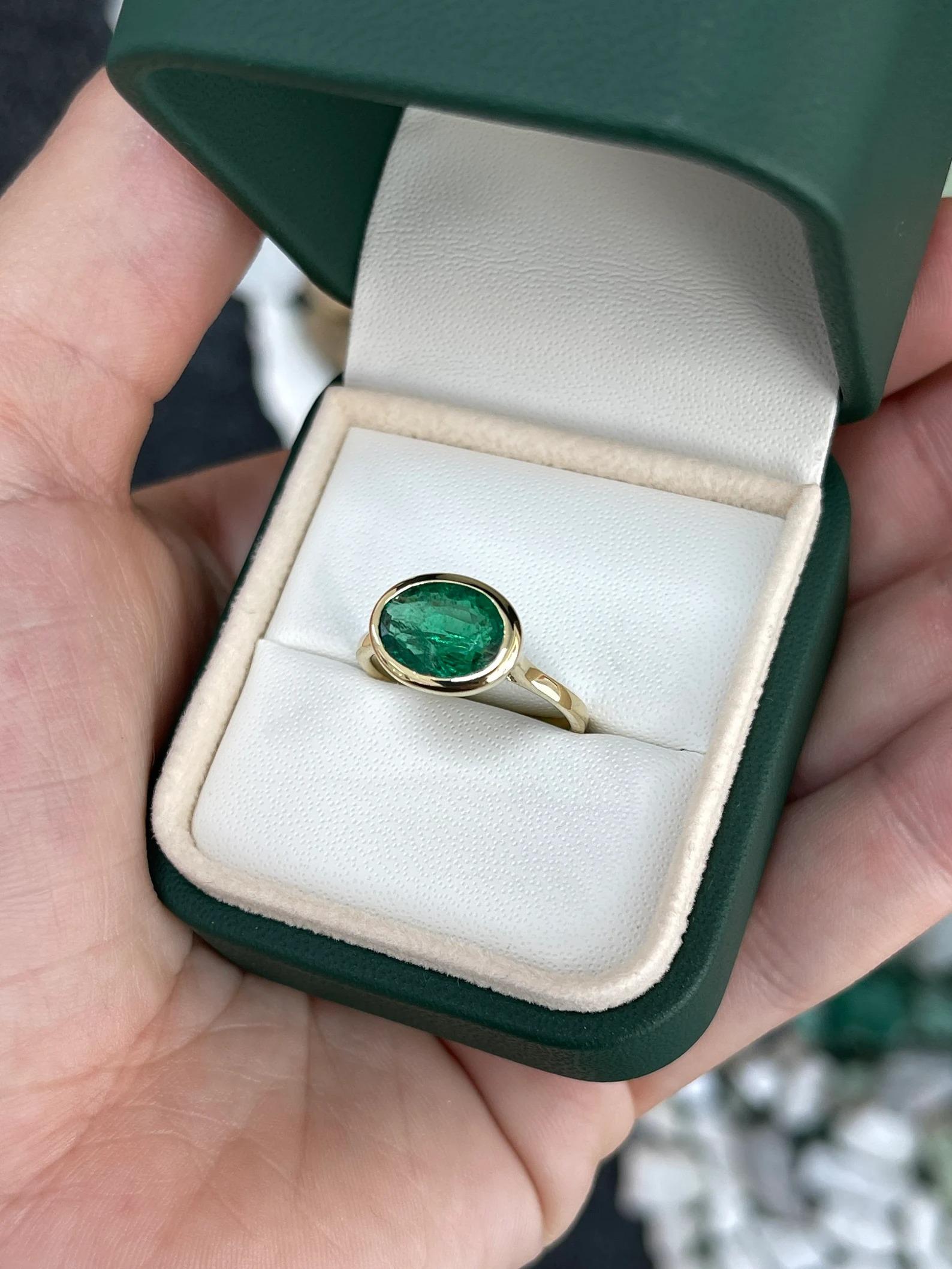 2.75 Carat Natural Vivid Green Oval Cut Emerald Bezel Set Ring East to West 18K For Sale 2