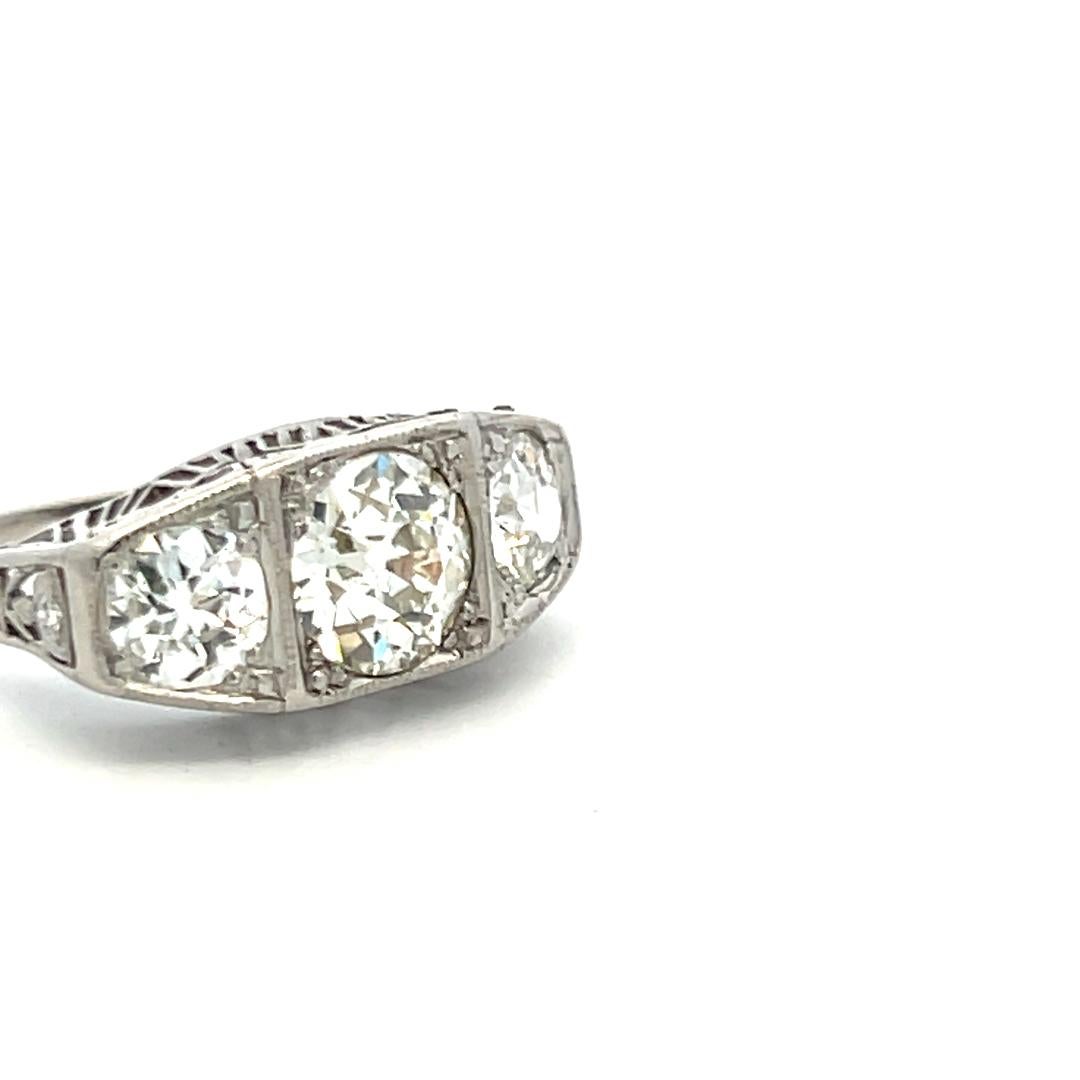 2.75 Carat Old European Cut J-K VS-VVS2 Diamond Platinum Three-Stone Ring For Sale 4