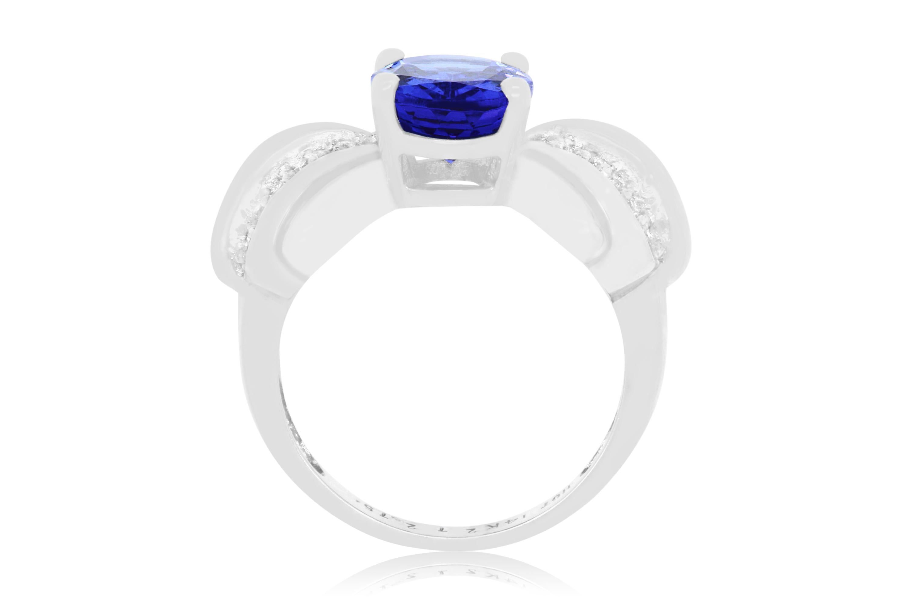 Contemporary 2.75 Carat Oval Shaped Tanzanite and 0.25 Carat White Diamond Bow Ring