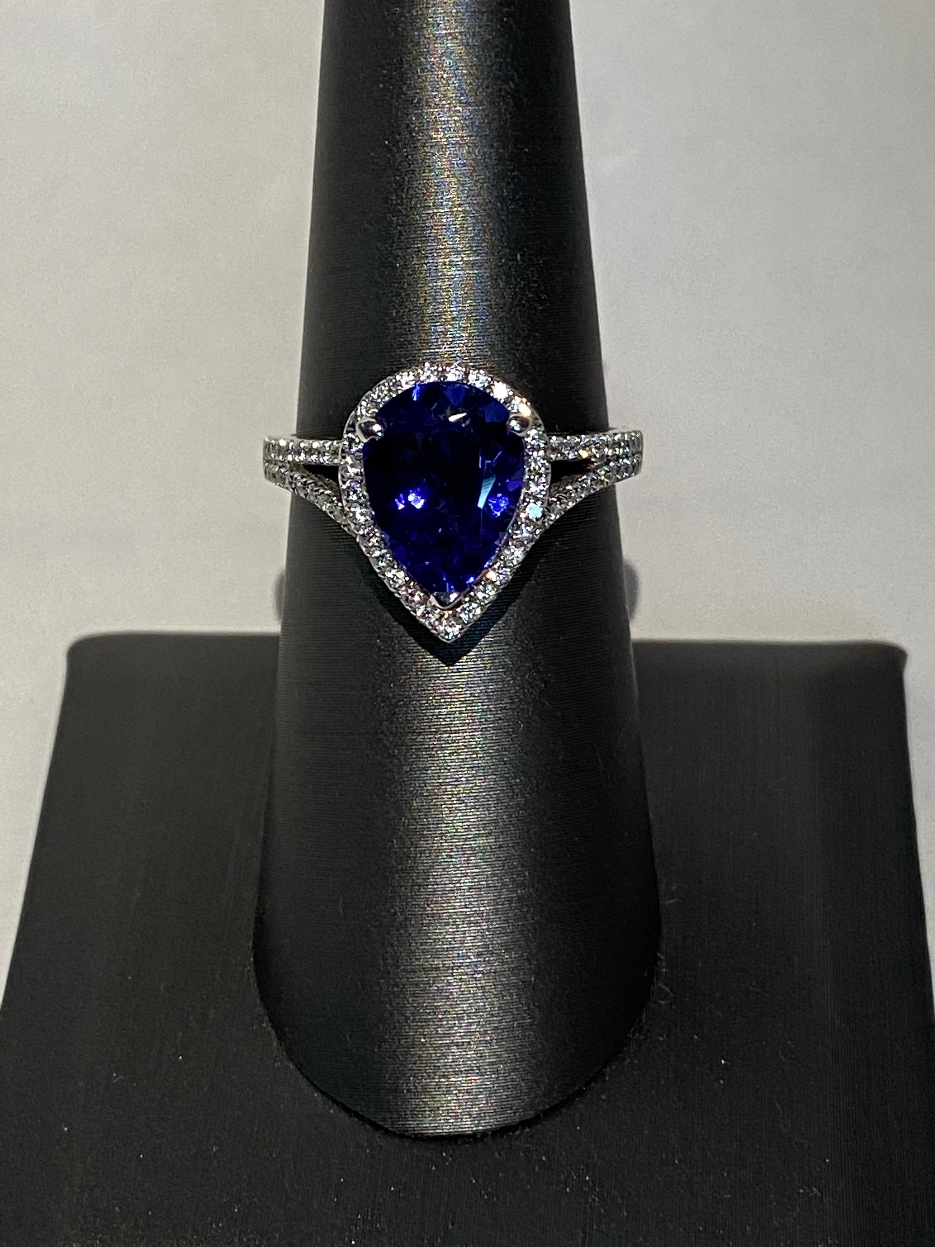 2.75 Carat Pear Shaped Tanzanite Diamond Halo Ring In New Condition For Sale In Trumbull, CT