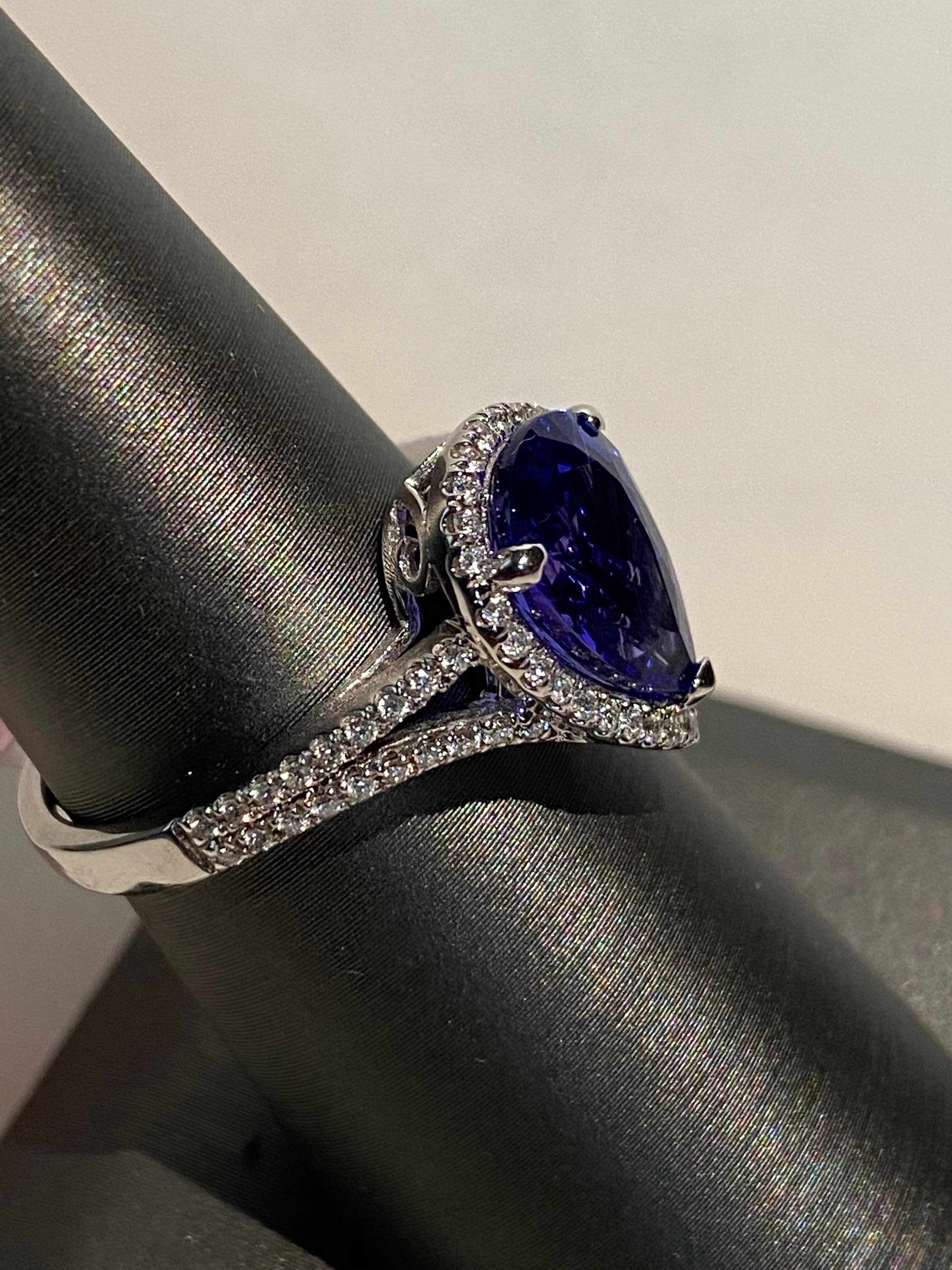 Women's 2.75 Carat Pear Shaped Tanzanite Diamond Halo Ring For Sale