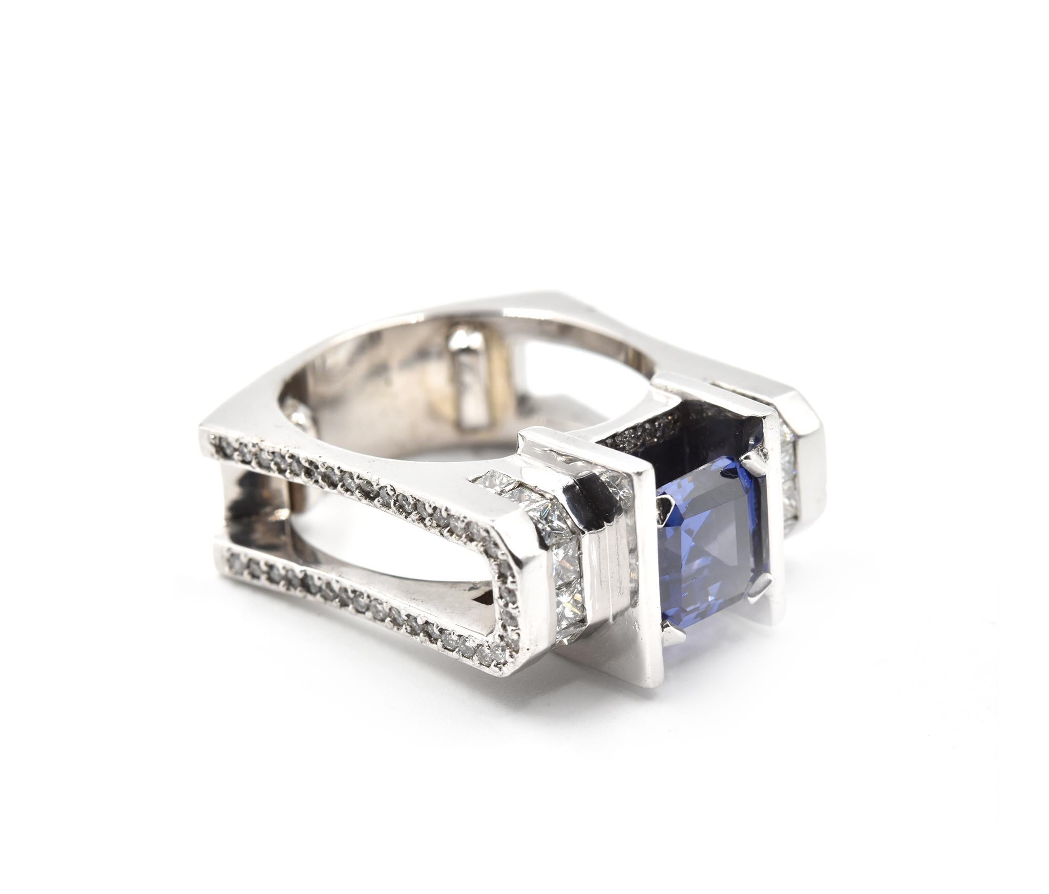 Designer: custom design
Material: 14k white gold
Tanzanite: one 2.75 carat weight
Diamonds: 98 round and princess cut = 0.90 carat weight
Color: H-I
Clarity: SI
Ring Size: 9 (please allow two additional shipping days for sizing requests)