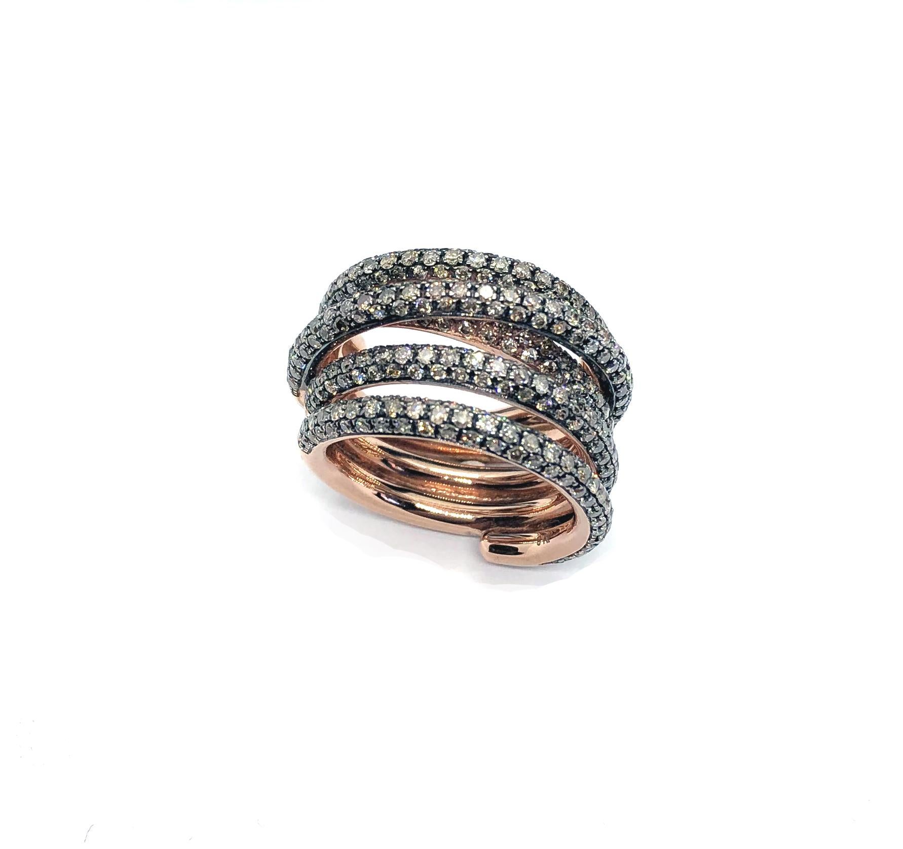 Twist strand Band ring in 9 Kt rose gold gr 16.15 hand crafted in our factory in Italy by ours  skilled artisans, this ring beholds 2.75 ct. round cut Vs fine quality brown diamonds.

Classic, sophisticated, fashion look, everlasting in time