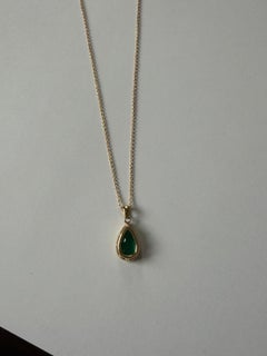 2.75 Pear Shaped Emerald Pendant on Yellow Gold