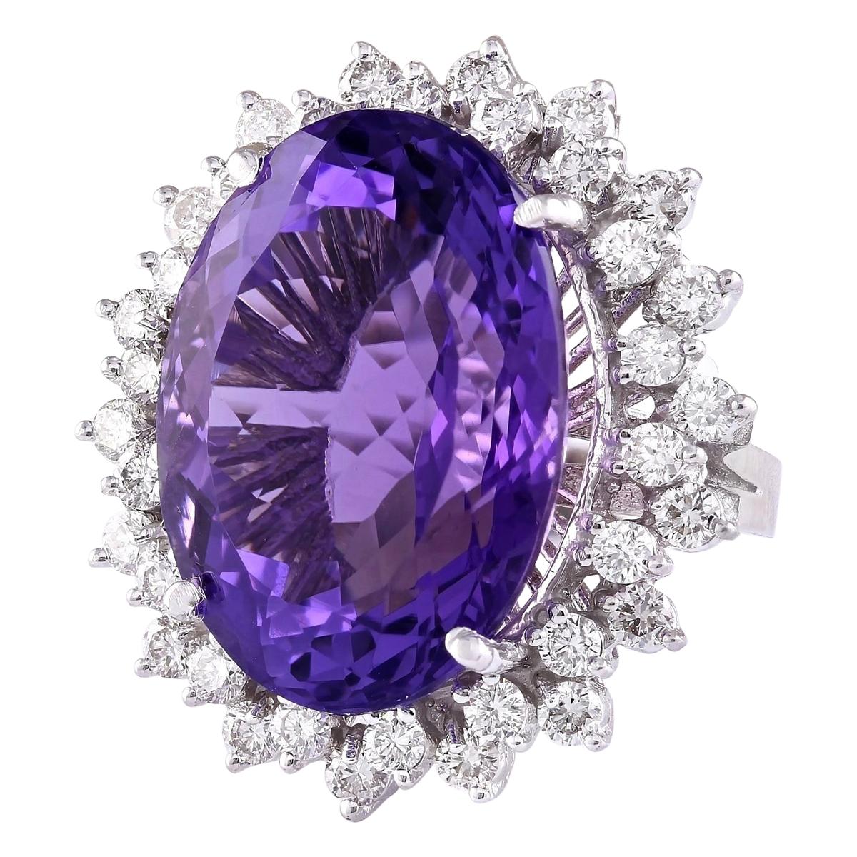 Stamped: 14K White Gold
Total Ring Weight: 15.2 Grams
Amethyst Weight is 25.50 Carat (Measures: 22.00x16.00 mm)
Diamond Weight is 2.00 Carat
Color: F-G, Clarity: VS2-SI1
Face Measures: 29.35x26.70 mm
Sku: [703692W]