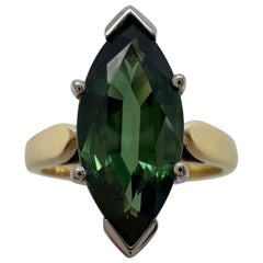 Anello solitario in oro giallo bianco 18 carati con zaffiro verde vivo taglio marquise da 2,75 carati