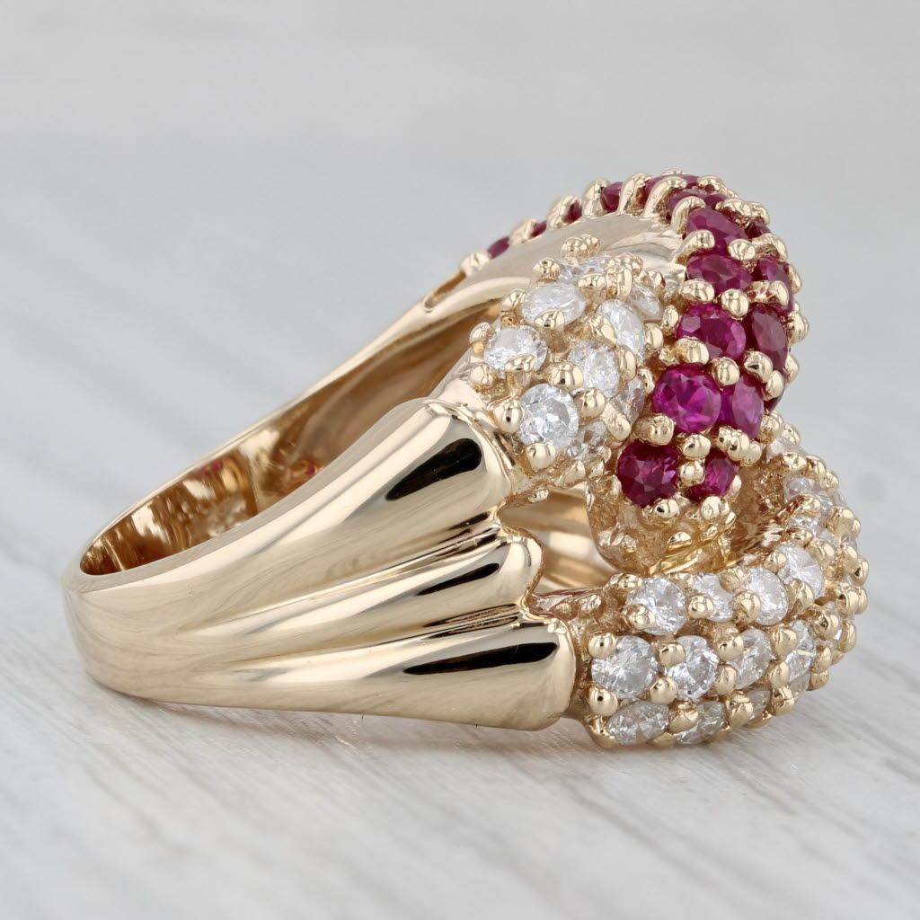 Gemstone Information:
- Natural Rubies -
Total Carats - 1.52ctw
Cut - Round Brilliant
Color - Red
Treatment - Routinely Enhanced 

- Natural Diamonds -
Total Carats - 1.23ctw
Cut - Round Brilliant
Color - F - G
Clarity - SI2 - I1

Metal: 14k Yellow