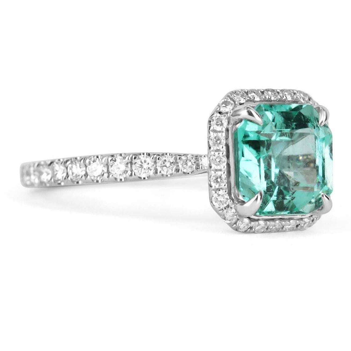 An exquisite radian Colombian emerald and diamond engagement/right-hand ring in solid 18K white gold. The gorgeous setting lets sit an excellent quality, earth-mined, natural emerald with beautiful, bluish-green color and excellent-very good eye