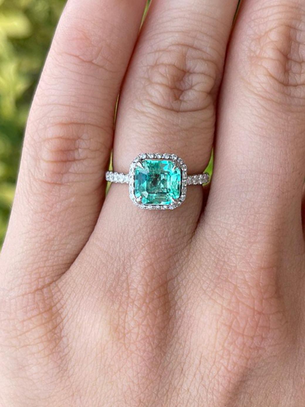 Women's 2.75tcw 18K Emerald & Diamond Halo Ring For Sale