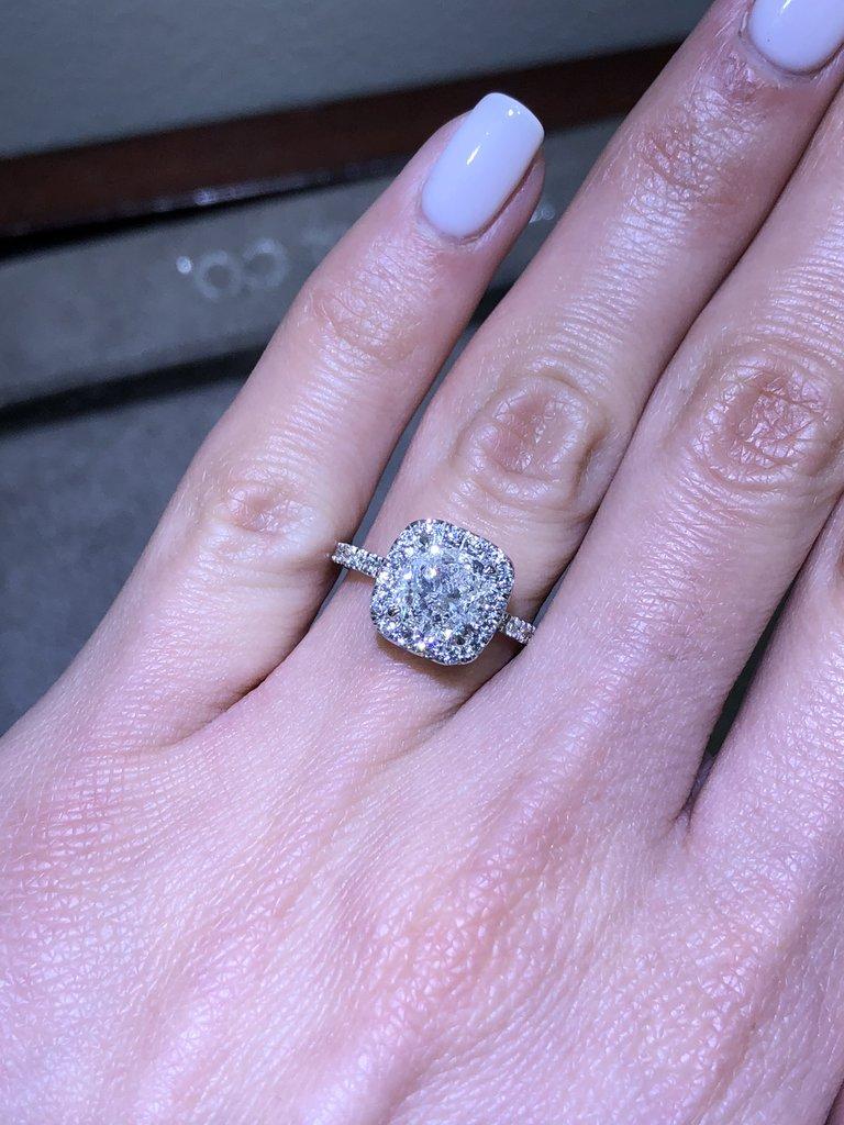 This exceptionally beautiful 2.76 ctw diamond engagement ring will astonish you with its incredible cut, quality, value, design and brilliance combination! The gorgeous 2.01 ct cushion cut diamond poised in the center of this handcrafted piece is