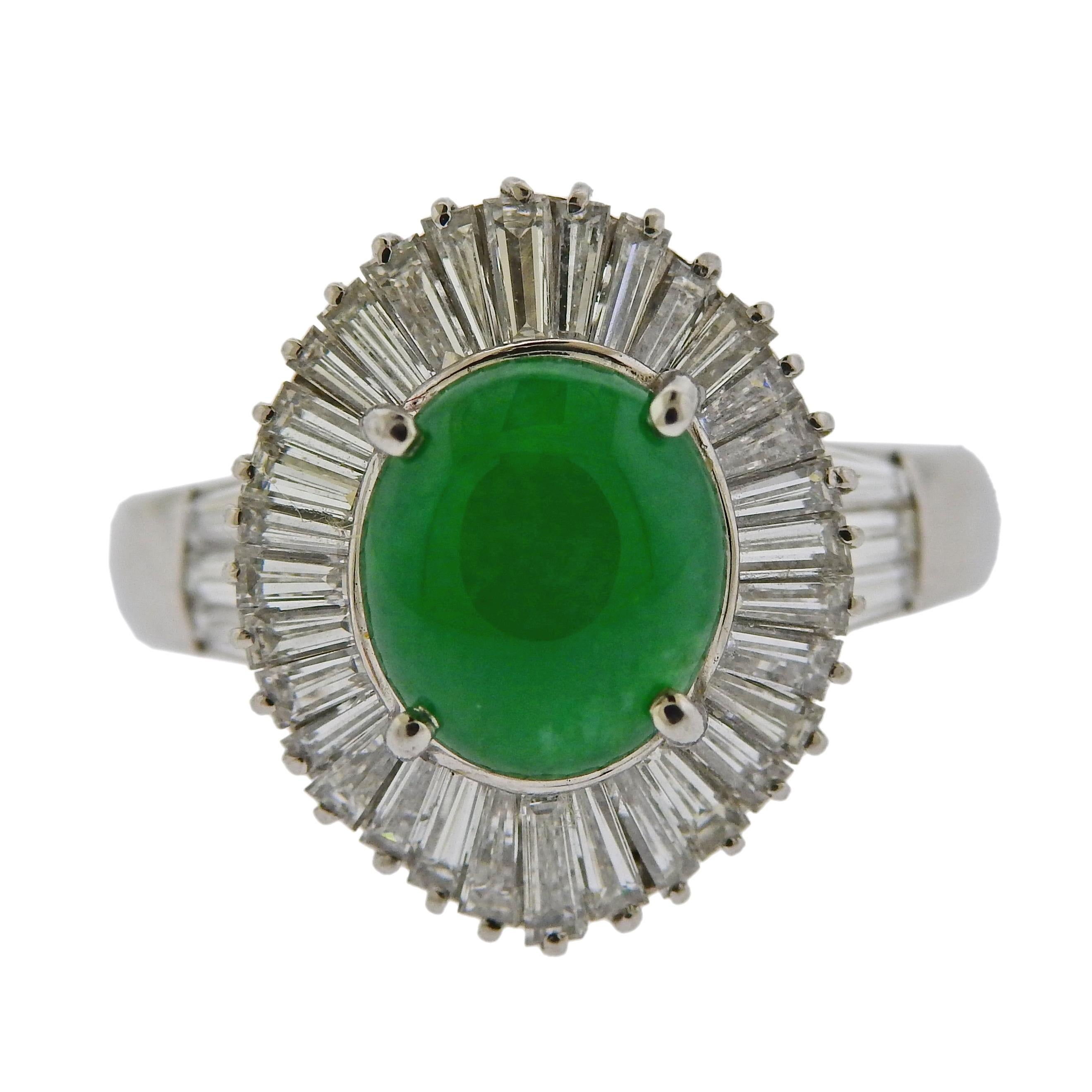 Platinum cocktail ring with 2.76ct oval jade, surrounded with 1.63ctw in VS-SI1/H diamonds. Ring size - 5.75, ring top - 18mm x 15mm. Weight is 8.3 grams. Marked: 2.76, D1.68, Pt900. 