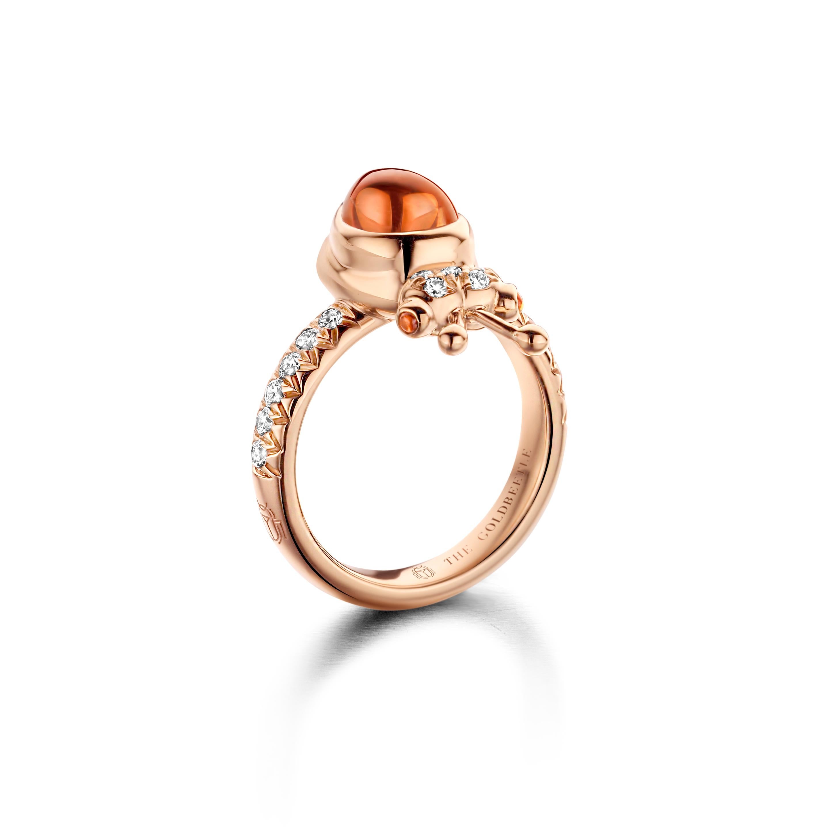 One of a kind lucky beetle ring in 18K rose gold 8,6 g set with the finest diamonds in brilliant cut 0,34Ct (VVS/DEF quality) one natural, mandarin garnet in pear cabochon cut 2,76Ct and two tsavorites in round cabochon cut. 

Celine Roelens, a