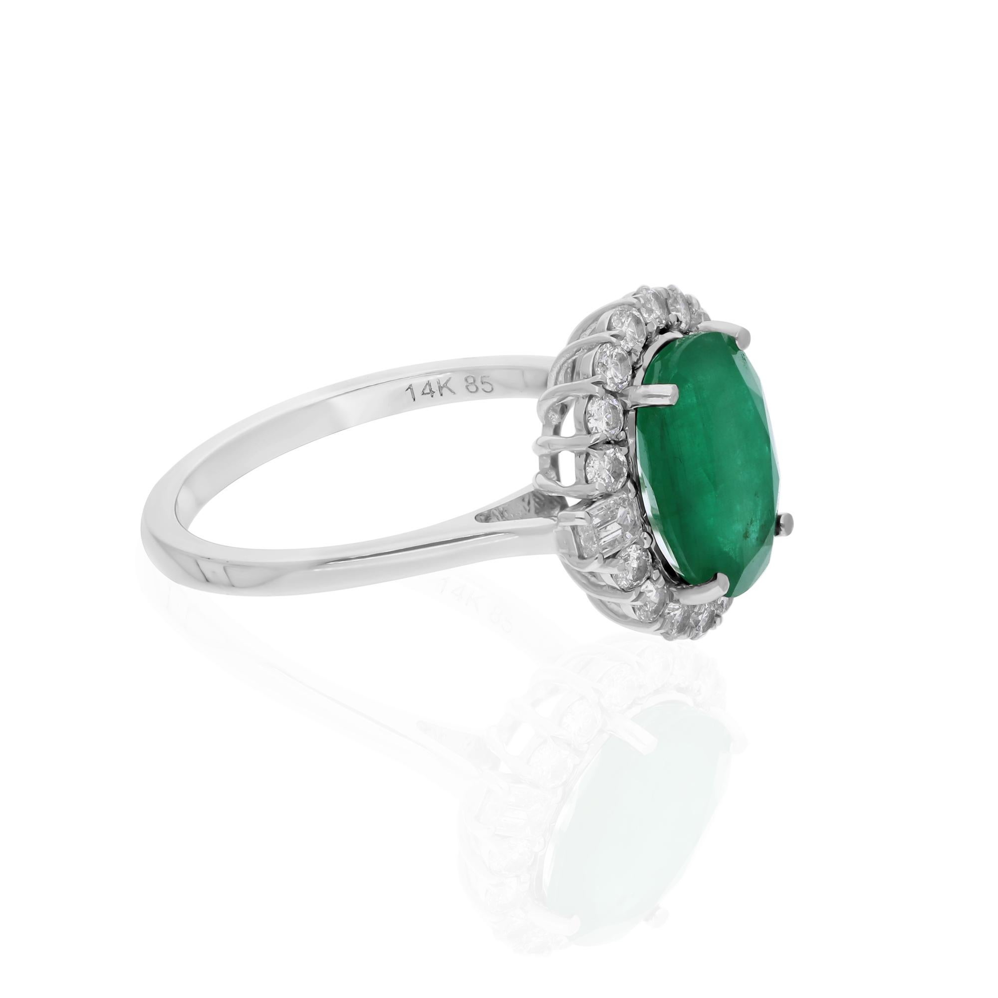 Cast from 14-karat gold, these exquisite ring is handset with 2.76 carats Zambian emerald and 0.59 carats of sparkling diamonds.

The ring is a size 7 US and may be resized to larger or smaller upon request. FOLLOW SPECTRUM JEWELS storefront to view
