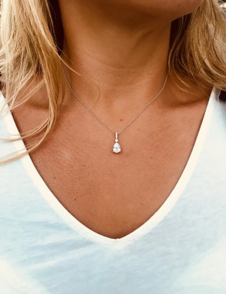 Featuring a 10.7ct pear shape, suspended on a sterling silver chain with an embellished bale.

Composed of 925 sterling silver with a high gloss white rhodium finish.

Chain measures 16ins with a 2ins extension.

Compliment with our matching Pear