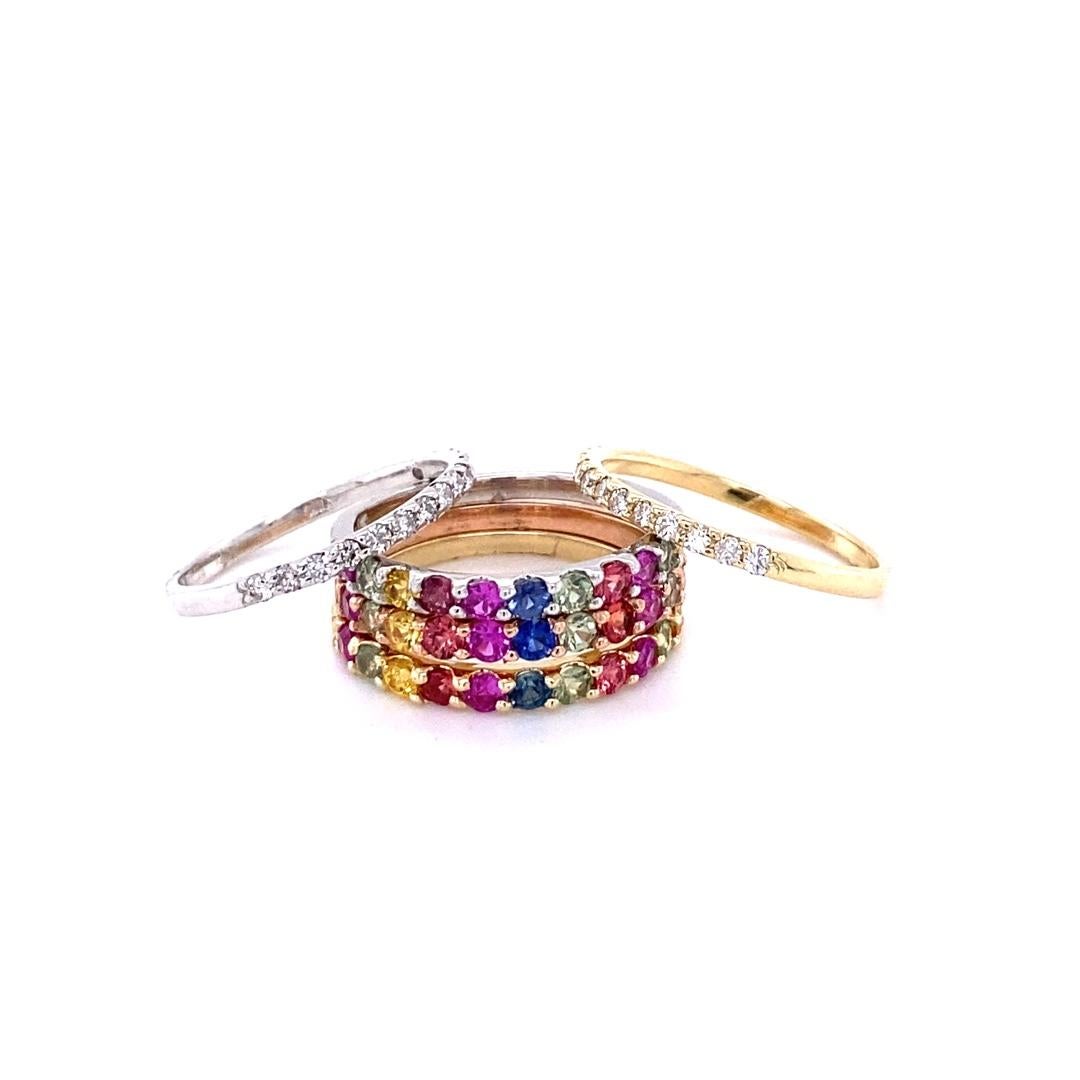 This set of stackable bands is versatile and can be worn separately or with other jewelry as well as this stack. 

There are 33 Multi Colored Sapphires that weigh 2.20 carats and the Diamond Bands have 30 Round Cut Diamonds that weigh 0.56 carats.