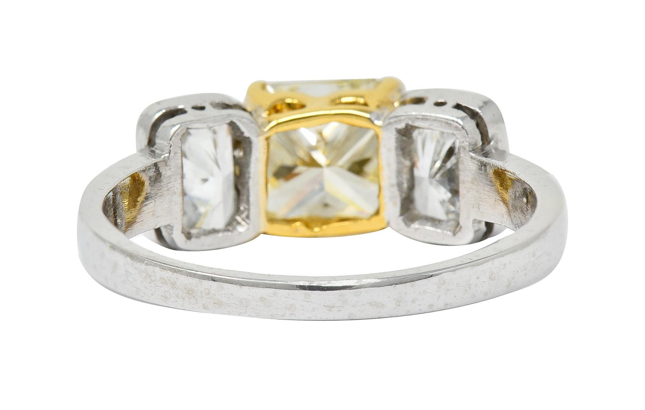 Radiant Cut 2.76 Carats Fancy Yellow & White Diamond 18 Karat Gold Platinum Three Stone Ring