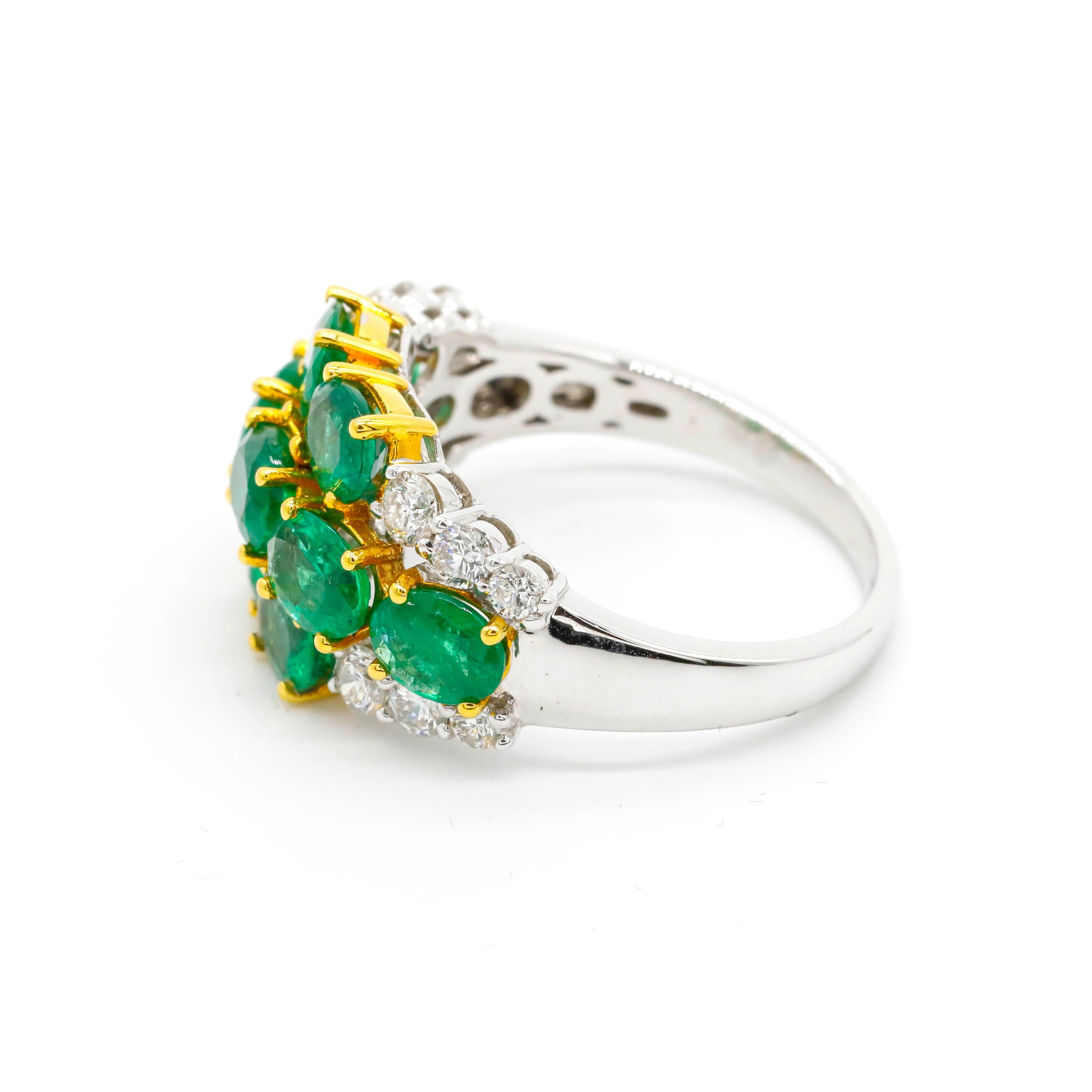 2.76 ct Oval Emerald and 0.53 ct Diamond Accent Floral Ring in 18k Two-Tone Gold

A glamorous addition to your jewelry collection. Accents high-quality diamonds hug and embrace oval-shaped vivid green emeralds, creating mesmerizing flower design.