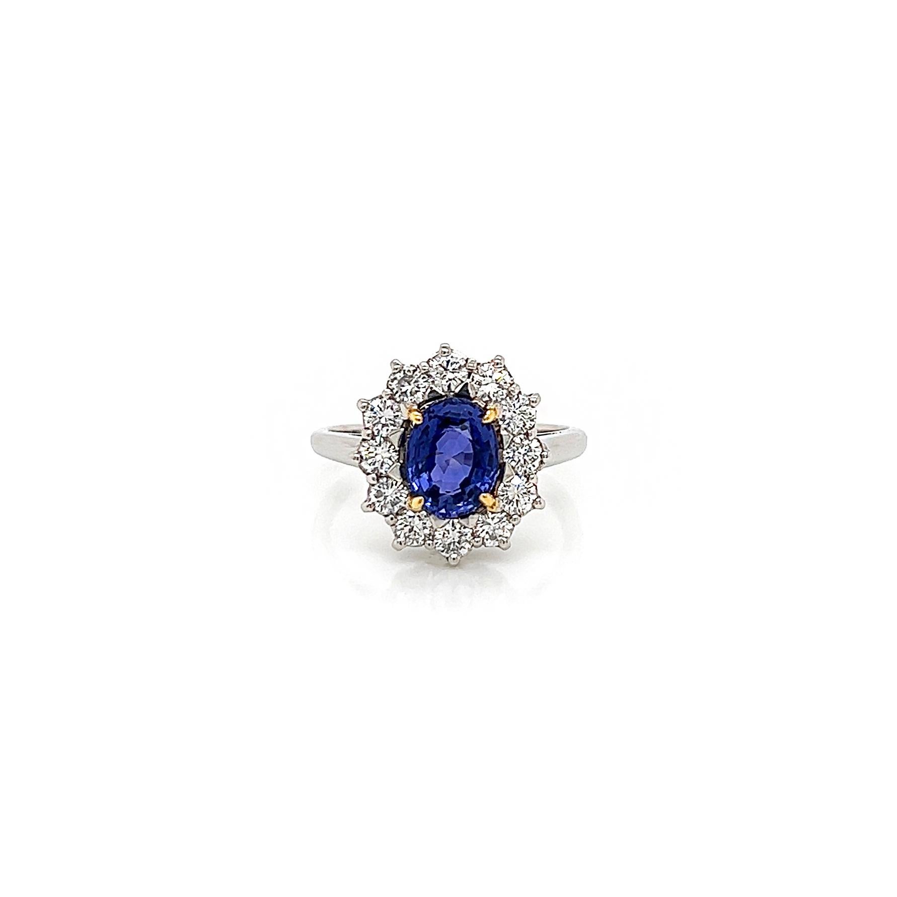 2.76 Total Carat Sapphire and Diamond Halo Ladies Engagement Ring. GIA Certified.

-Metal Type: Platinum
-1.68 Carat Oval Cut Natural NON Heated Blue Sapphire, GIA Certified 
-Sapphire Color: Blue changing to Bluish Violet
-Sapphire Measurements: