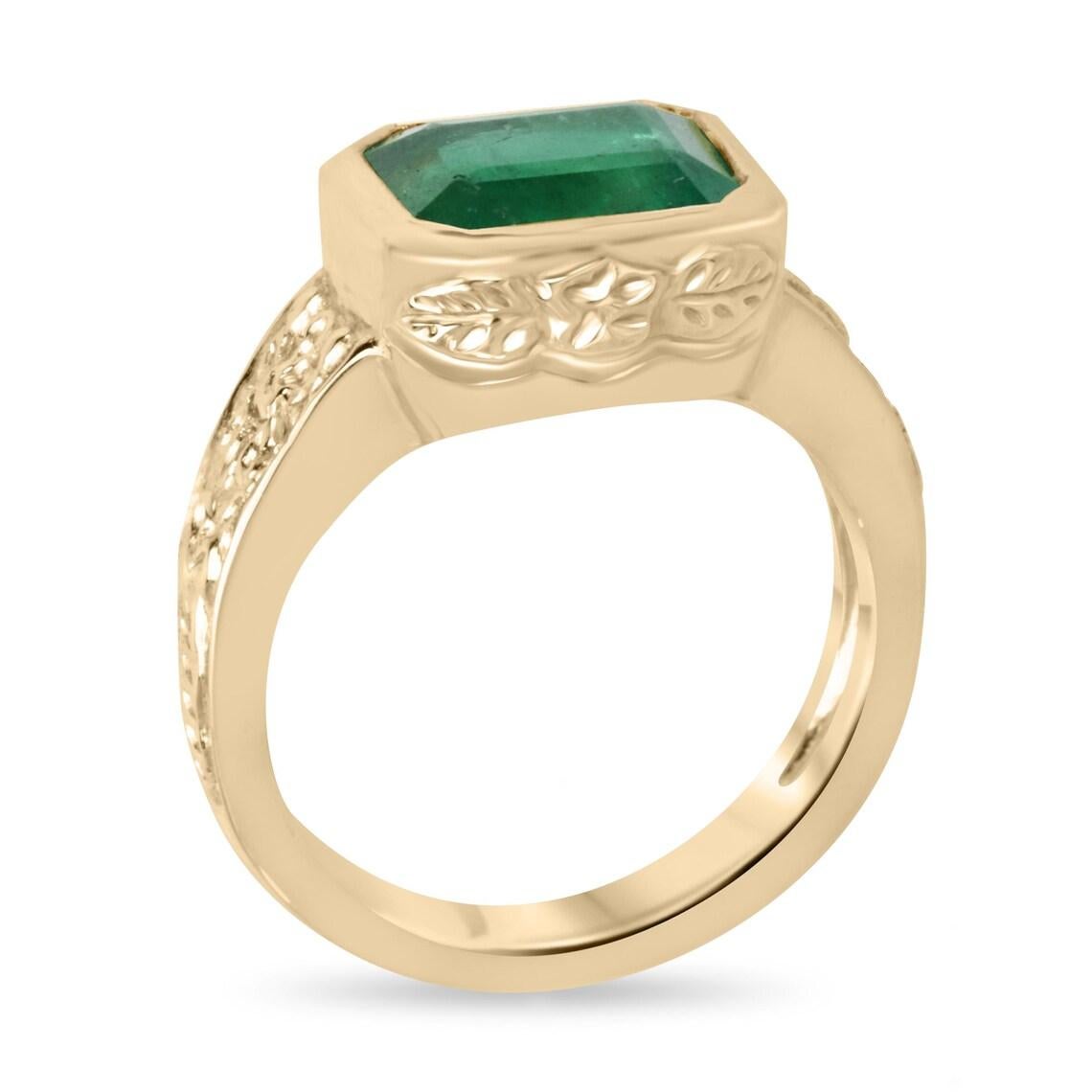 Questo squisito anello con smeraldo solitario da donna mette in mostra un affascinante smeraldo tagliato incastonato in un elegante orientamento da est a ovest, che rivela una lussureggiante tonalità verde con sfumature profonde e una chiarezza