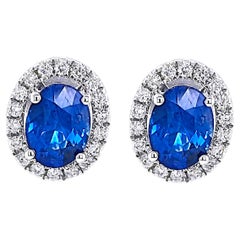 Orecchini in oro bianco con diamanti tondi e zaffiro blu da 2,77 carati